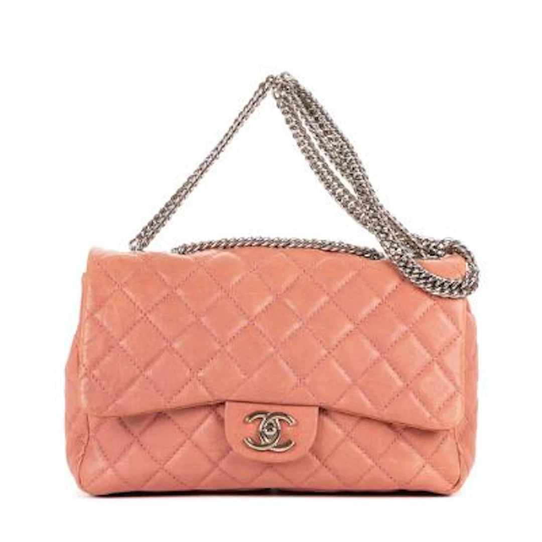 Chanel: A flap bag in quilted rose colored leather with silver-toned