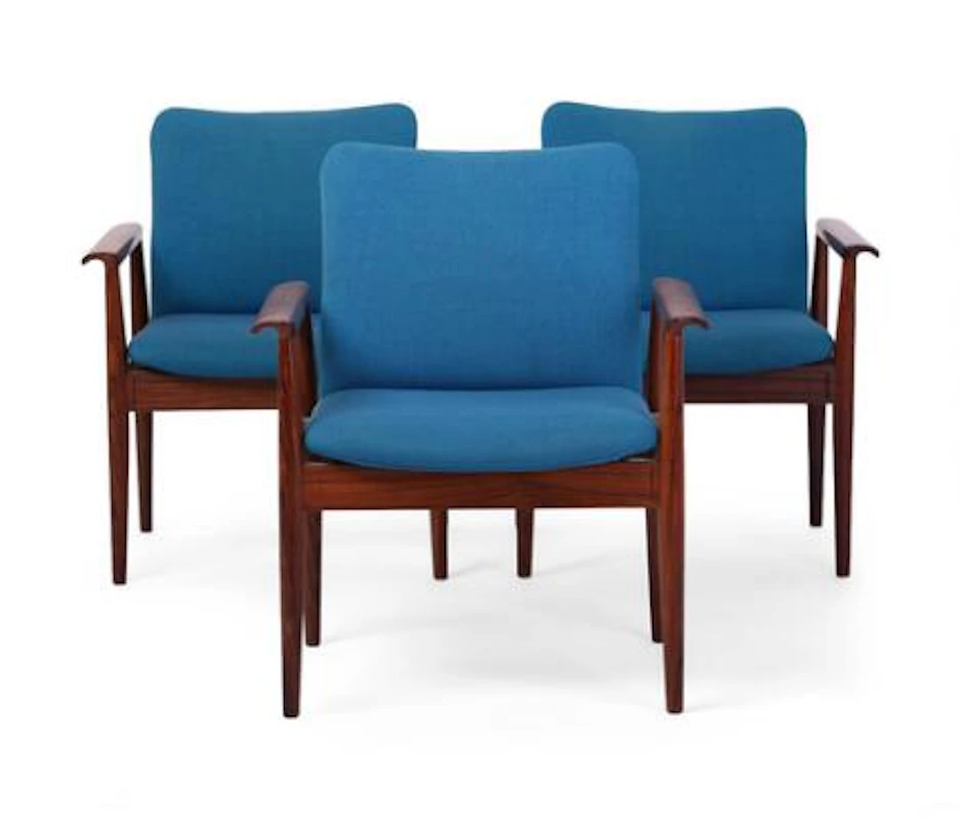 Finn Juhl: "Diplomat". Three armchairs in rosewood, upholstered in