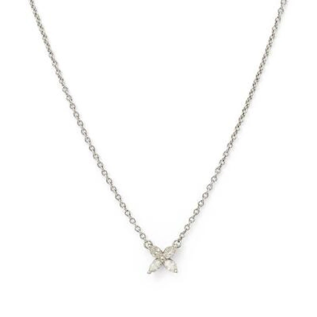 Tiffany & Co.: A "Victoria" necklace set with a diamond pendant, mounted