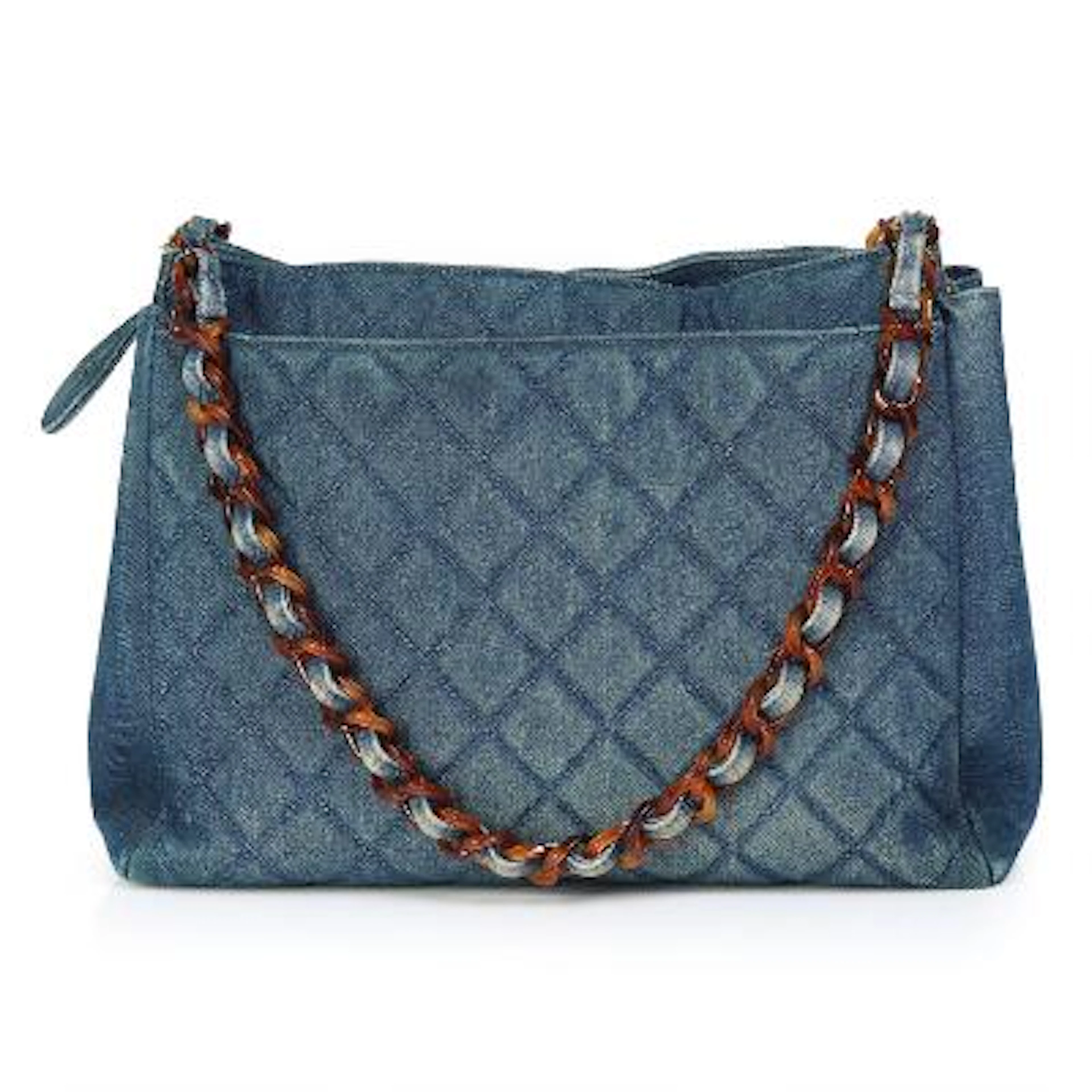 Chanel: A bag of quilted blue denim with hardware of brown plastic