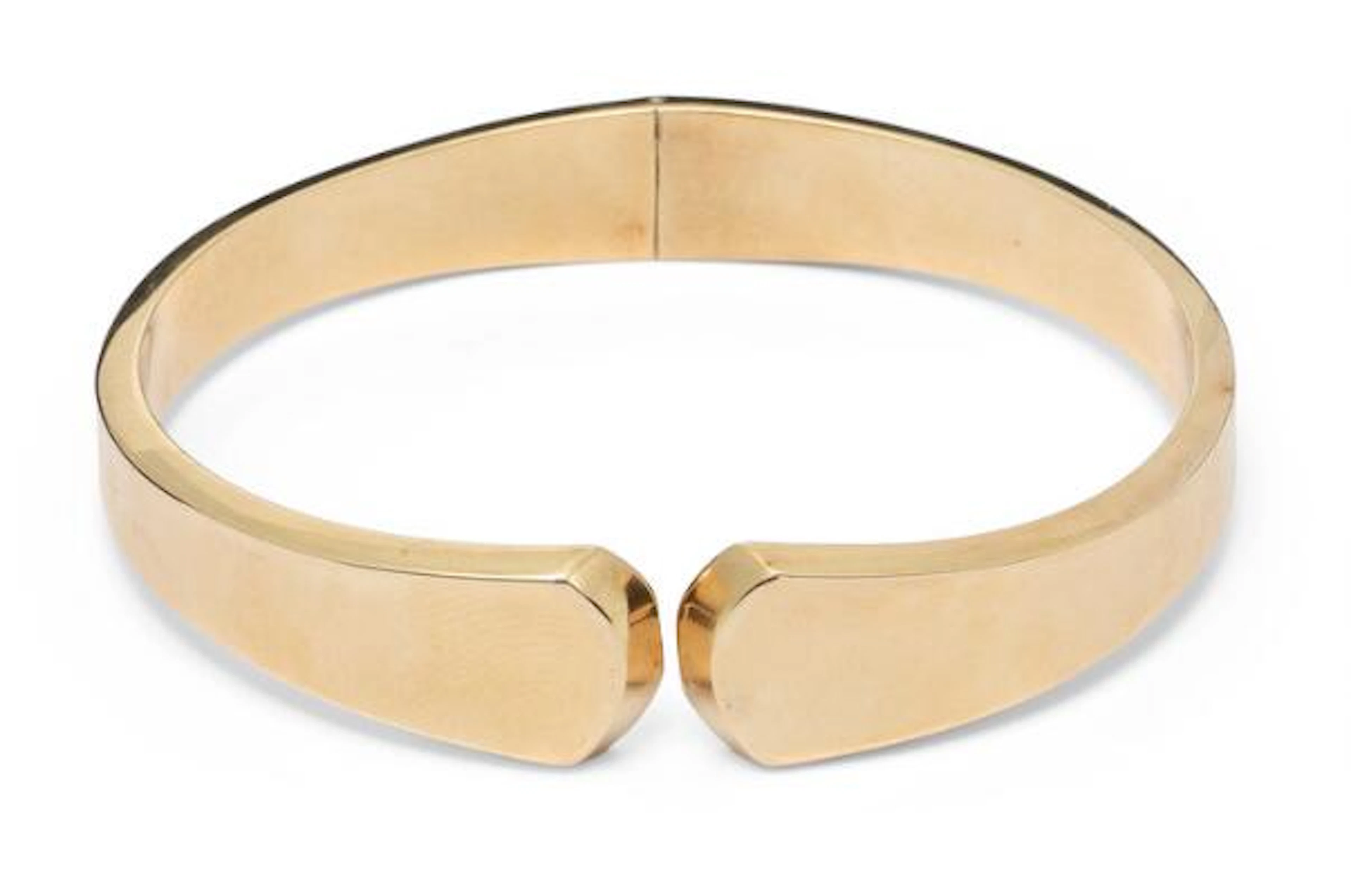 GIFA: An openable bangle of 14k gold. Weight app. 16.5 g. W. 13 mm.