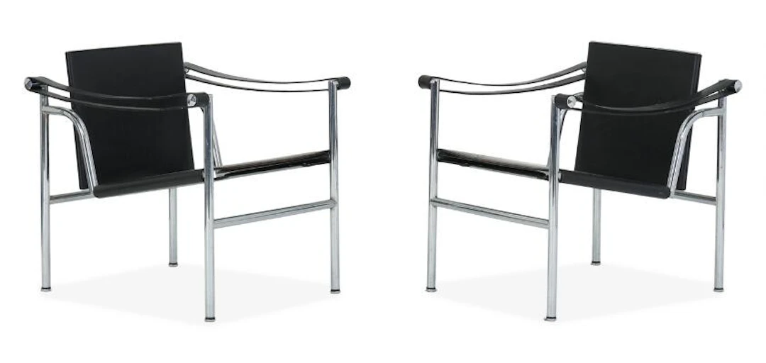 Le Corbusier: "LC 1". A pair of easy chairs with frame of chromed