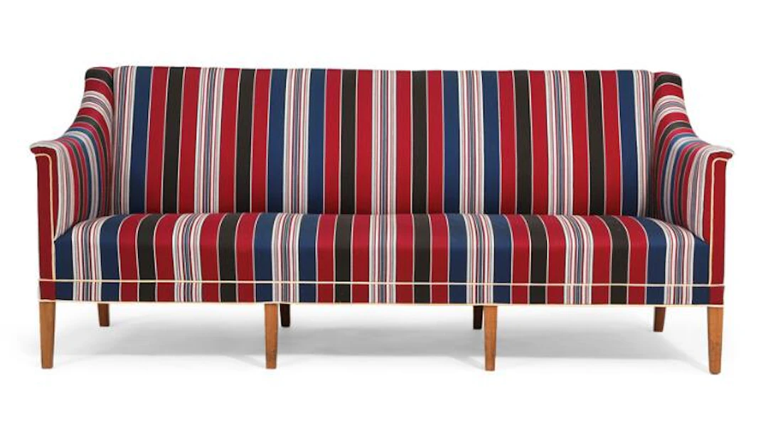 Kaare Klint: Three seater sofa with mahogany legs, seat, sides and