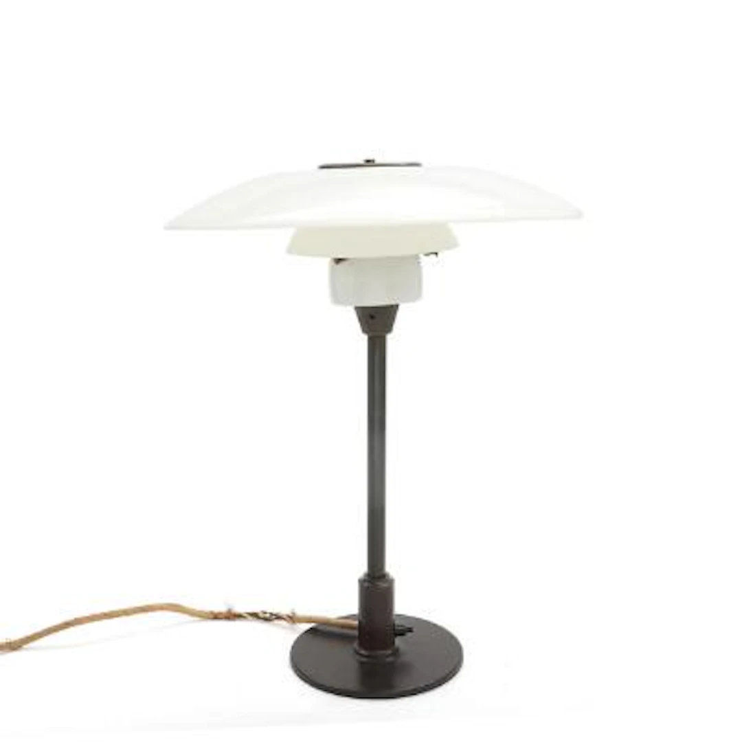 Poul Henningsen: "PH-3½/2". Table lamp with browned brass stem and