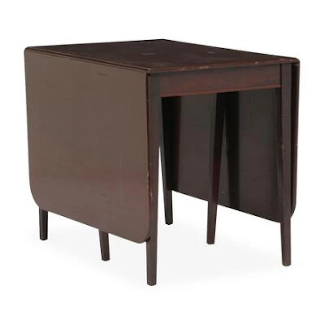 A drop leaf table of mahogany, each side with flap and gate leg. 20th