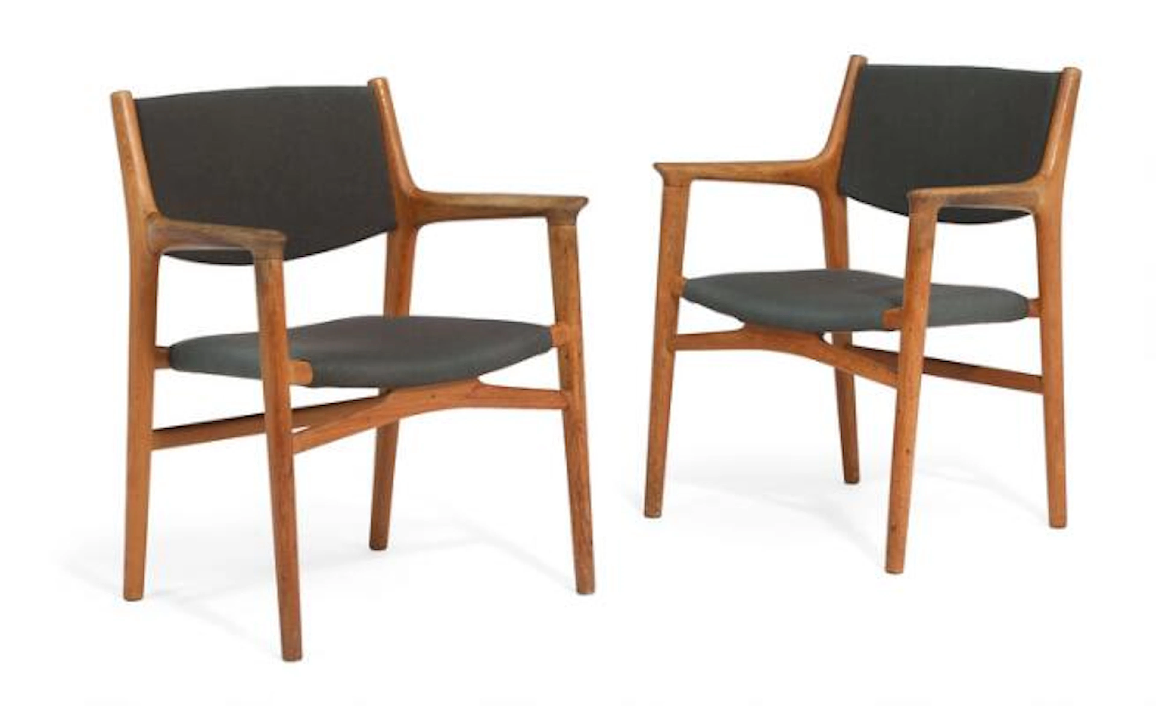 Hans J. Wegner: "JH 515". A pair of rare oak armchairs. Seat and back