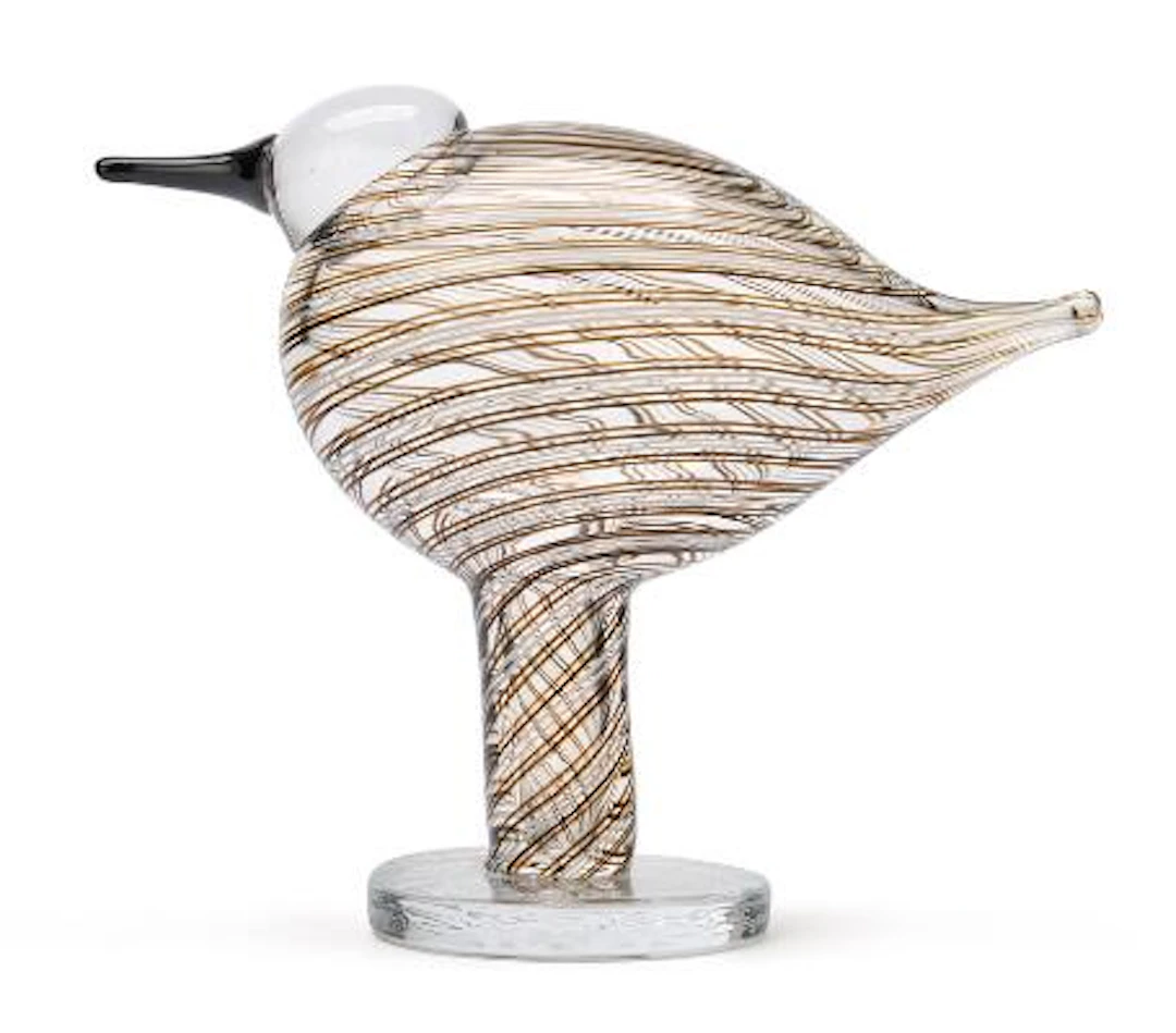 Oiva Toikka: A bird in clear glass with applied brown and white stripes.