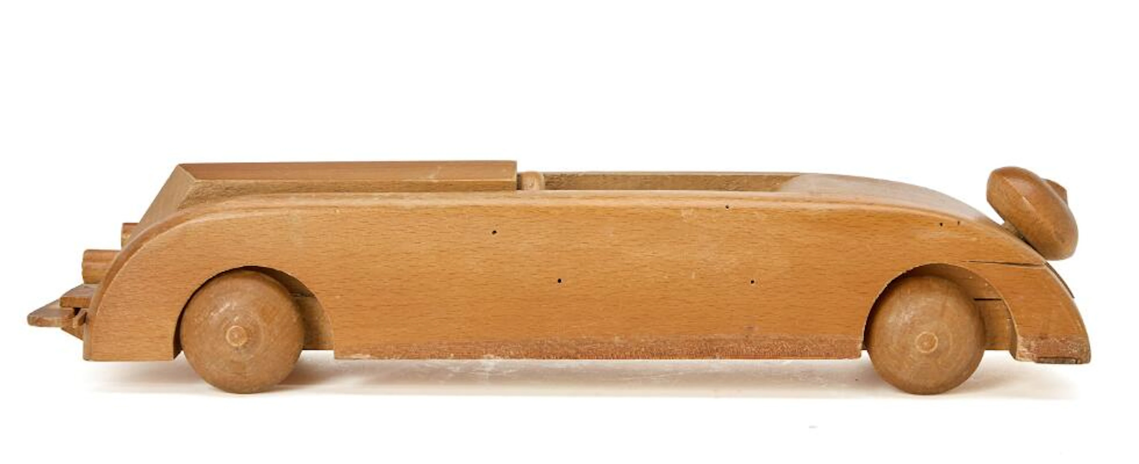 Ole Wanscher: “Streamlined car”. A lacquered beech toy car. Made by