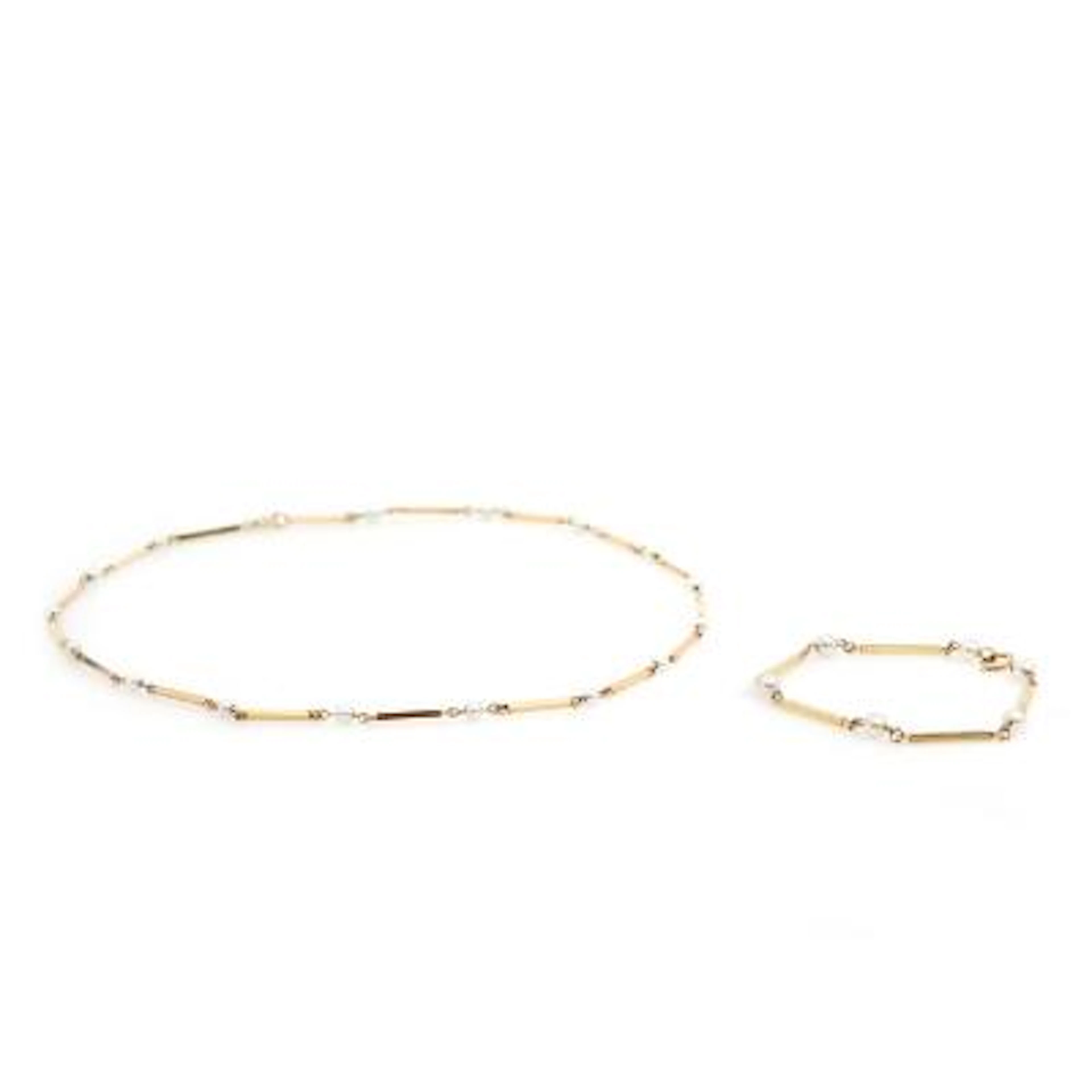 A pearl bracelet and necklace set with numerous cultured pearls, mounted