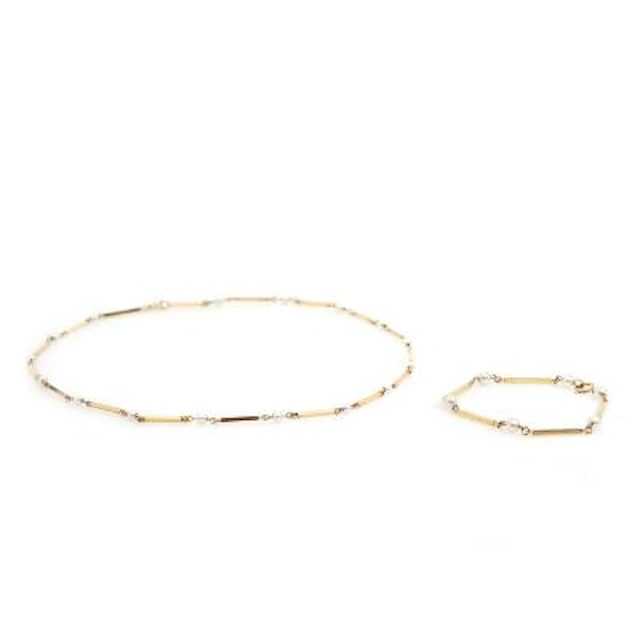 A pearl bracelet and necklace set with numerous cultured pearls, mounted