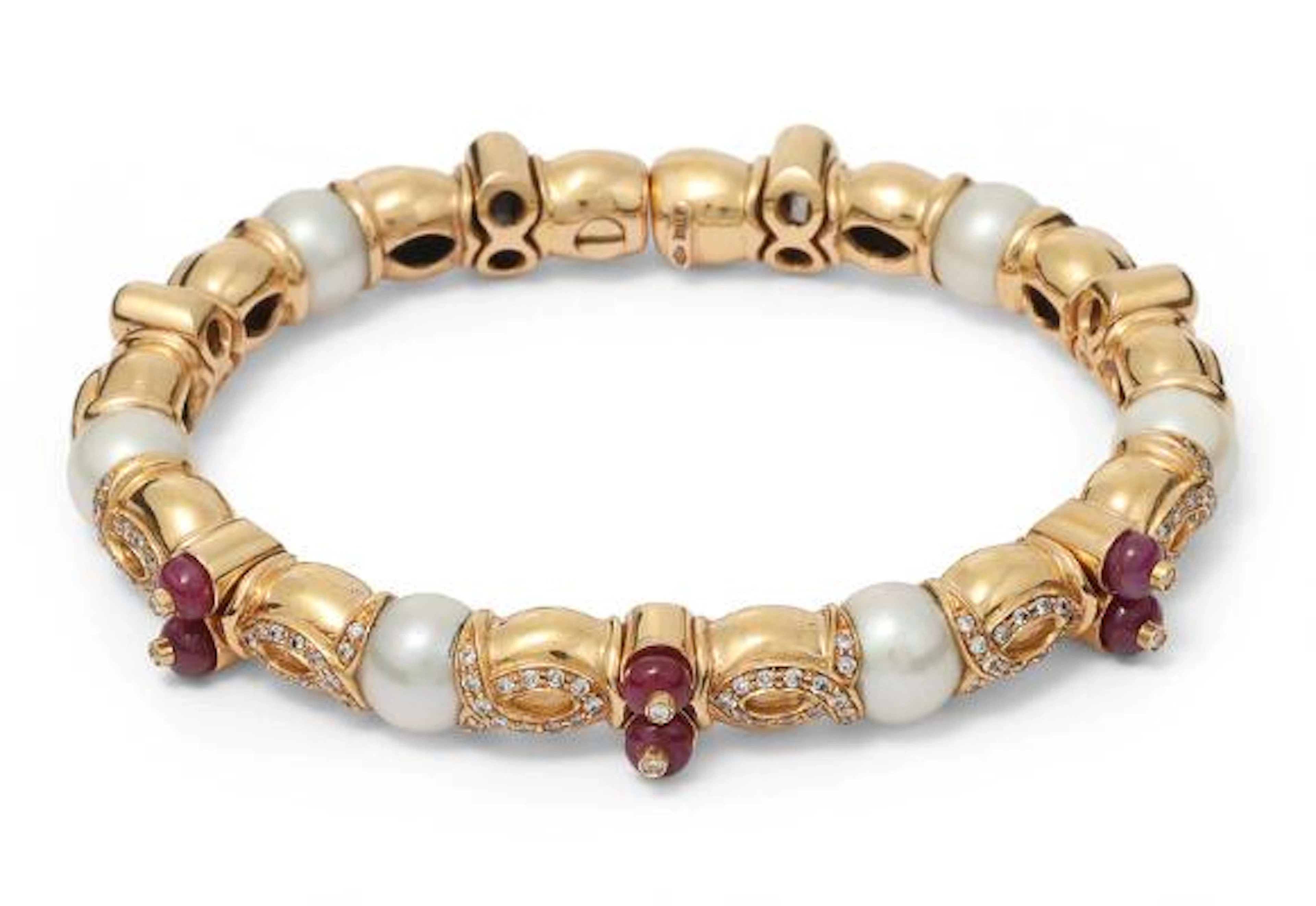 A ruby and diamond bracelet set with rubies, diamonds and cultured