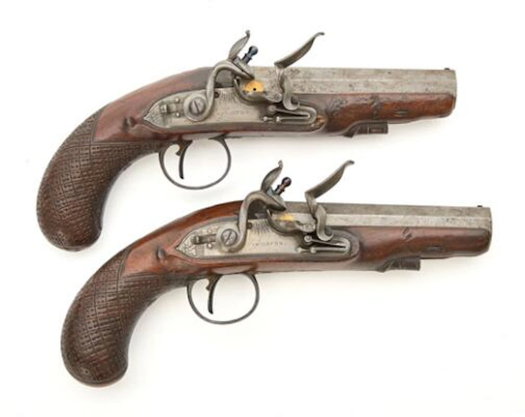 A pair of English flintlock pistols, circa 1800–10, by Samuel Bruun.