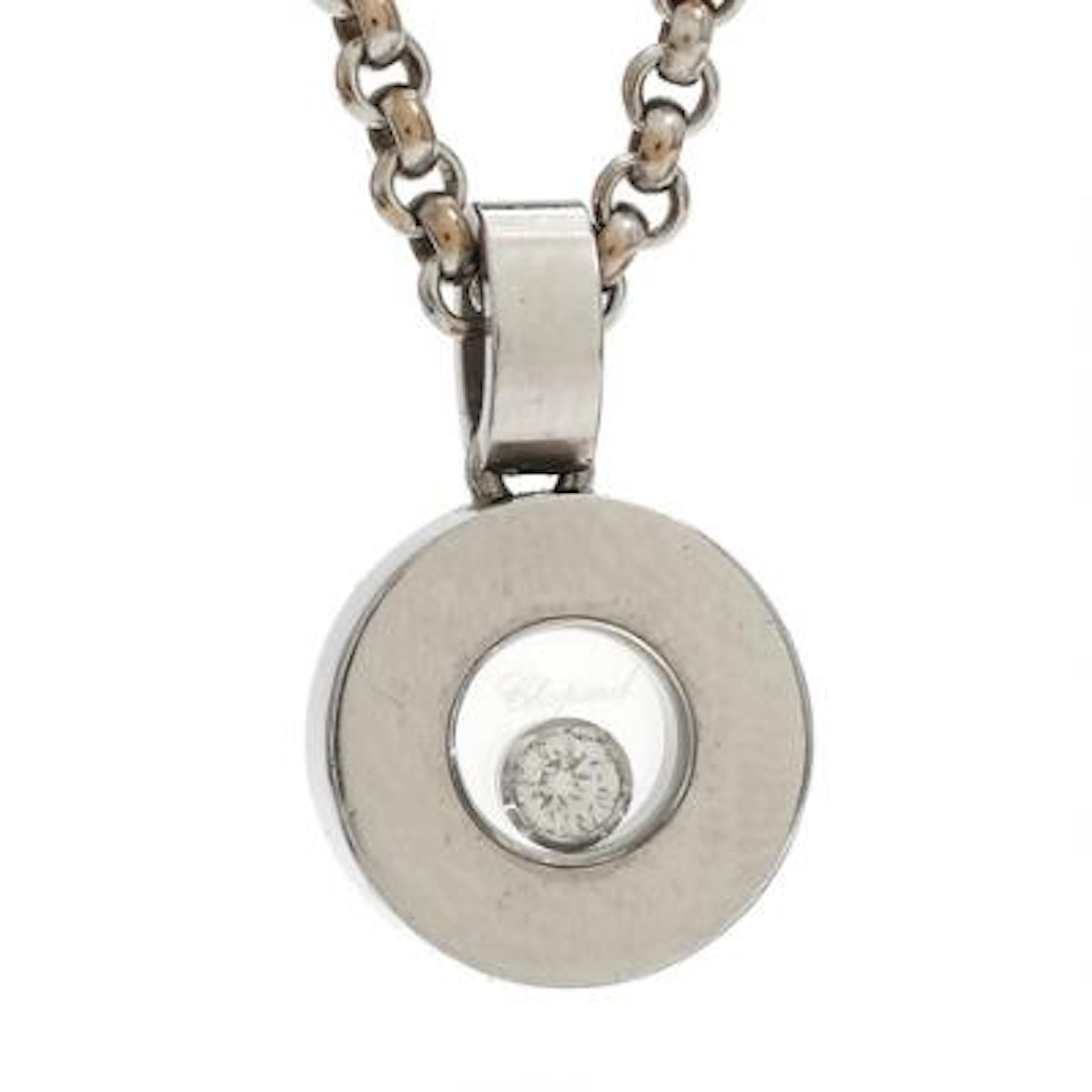 Chopard: A "Happy Diamond" diamond pendant and necklace set with a
