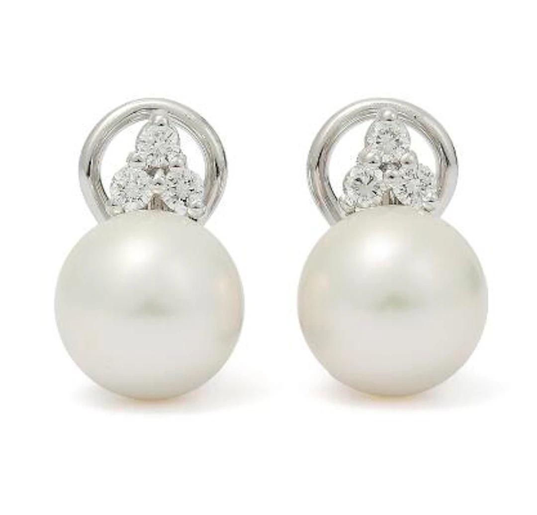 A pair of pearl and diamond ear studs each set with a South Sea cultured