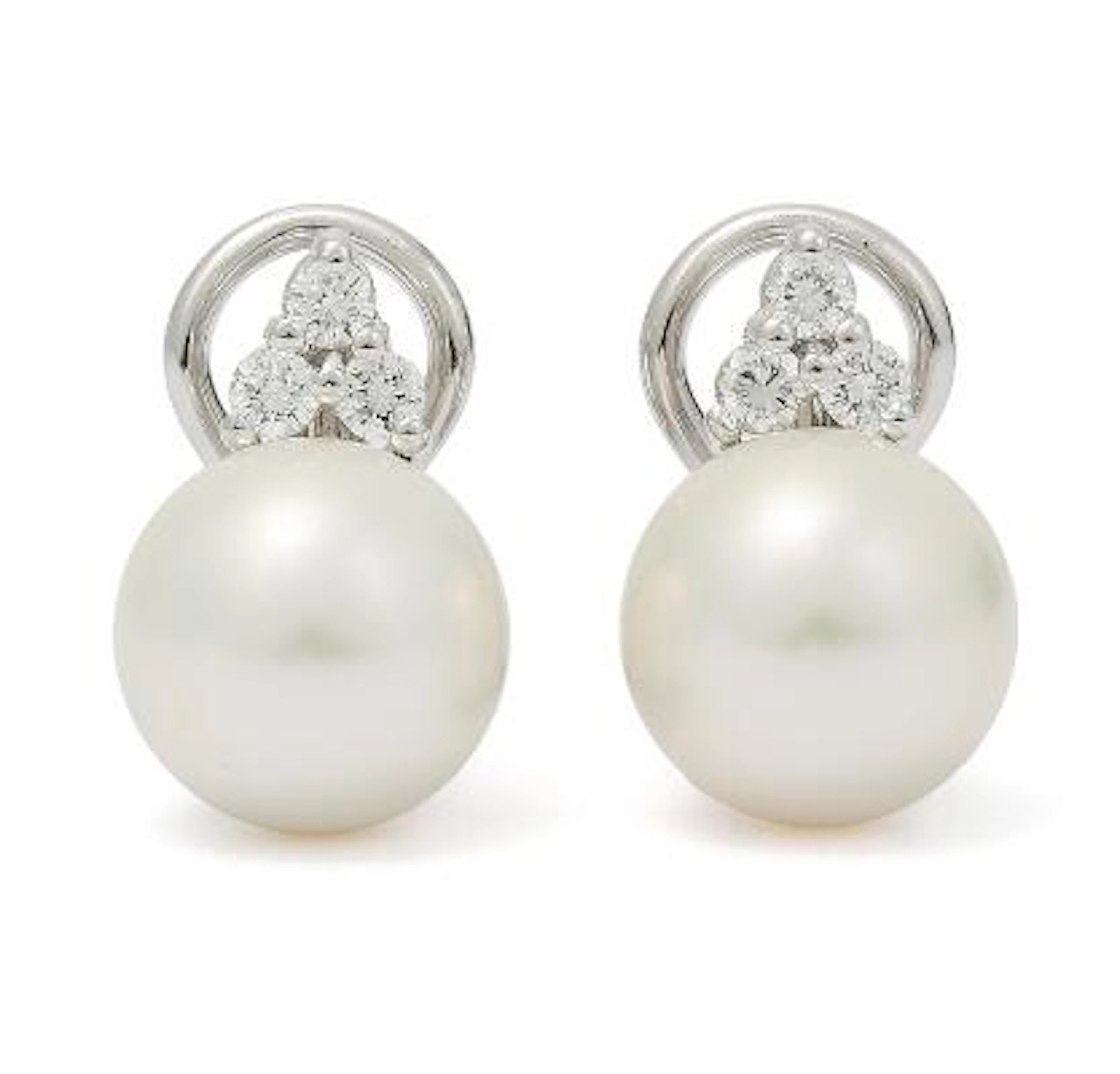 A pair of pearl and diamond ear studs each set with a South Sea cultured