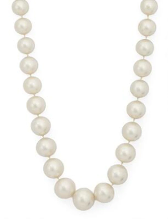 A graduated pearl necklace set with numerous South Sea cultured pearls