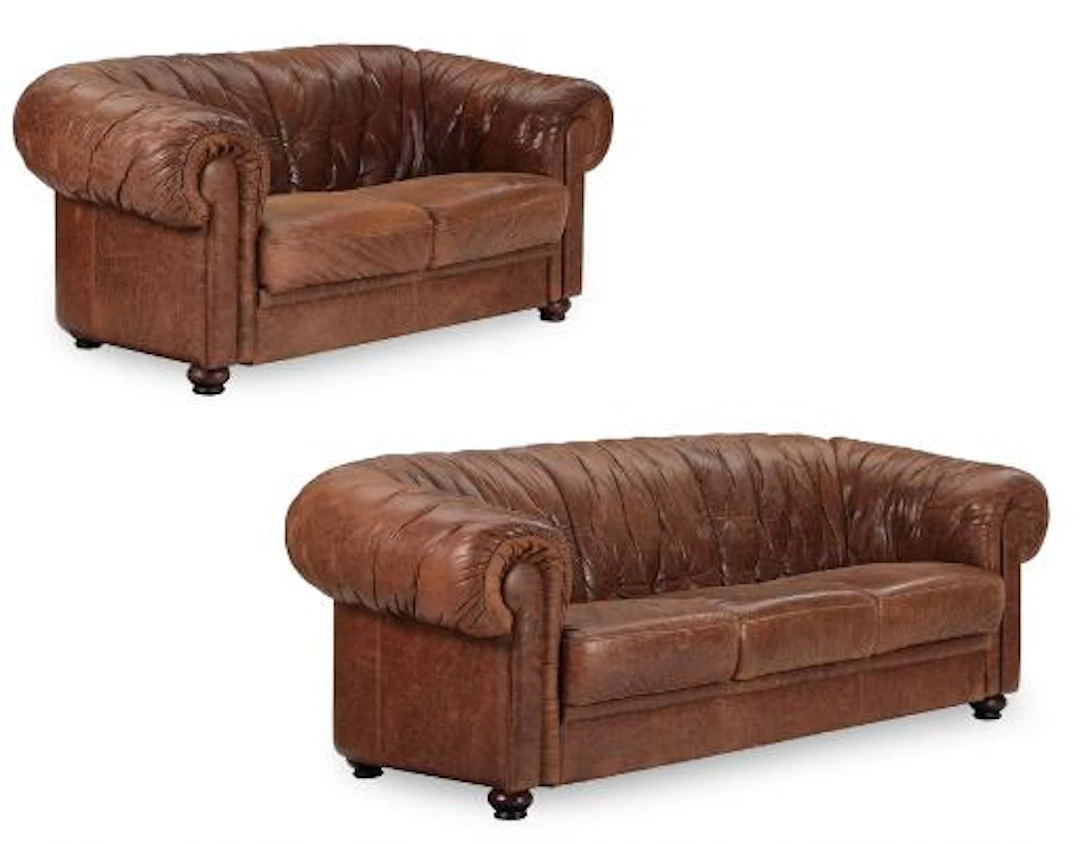 Piquattro Italia: A pair of Chesterfield sofas. 20th century. Manufactured