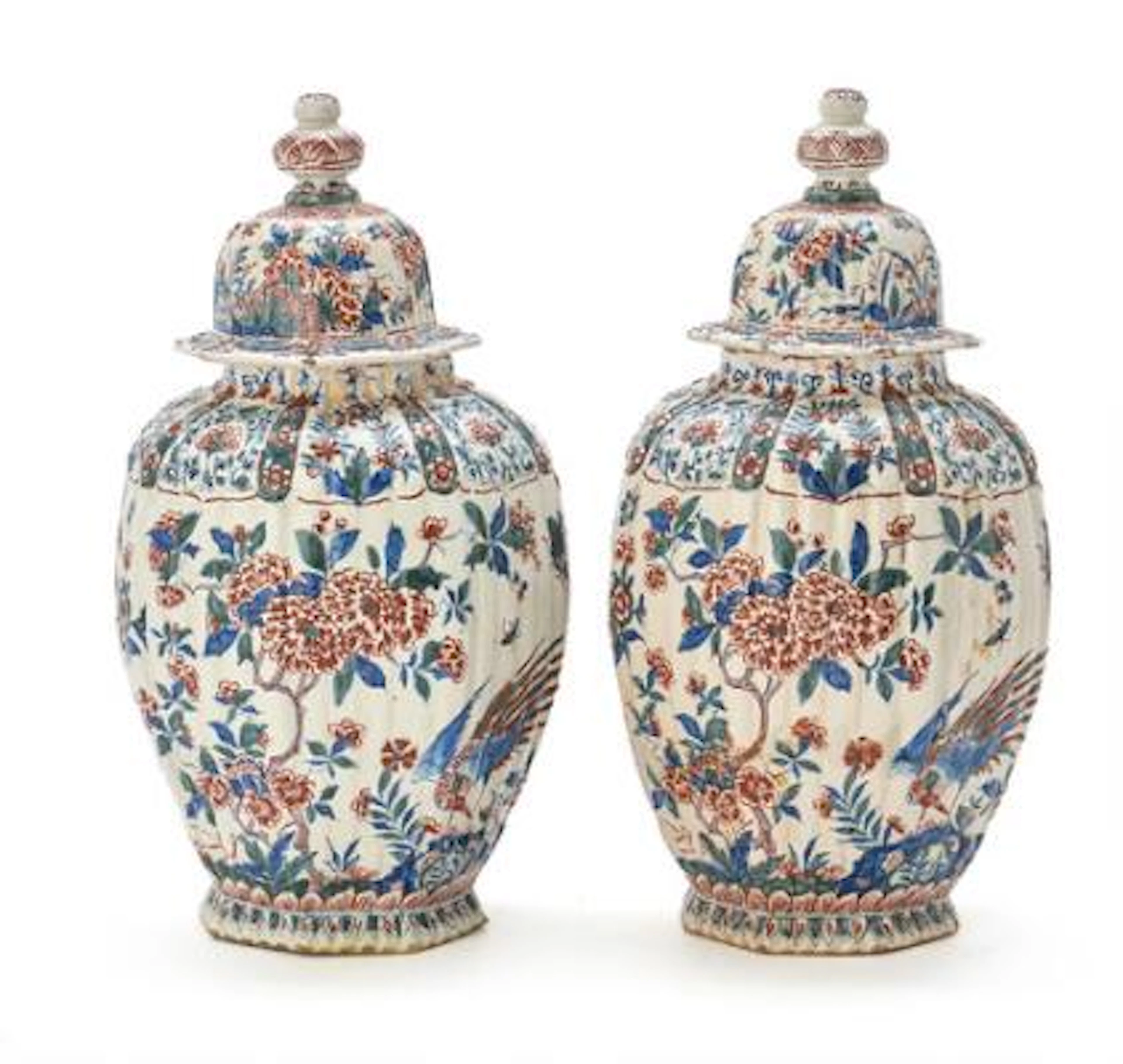 A pair of Delft faience covered jars, signed AP for Anthony Pennis.