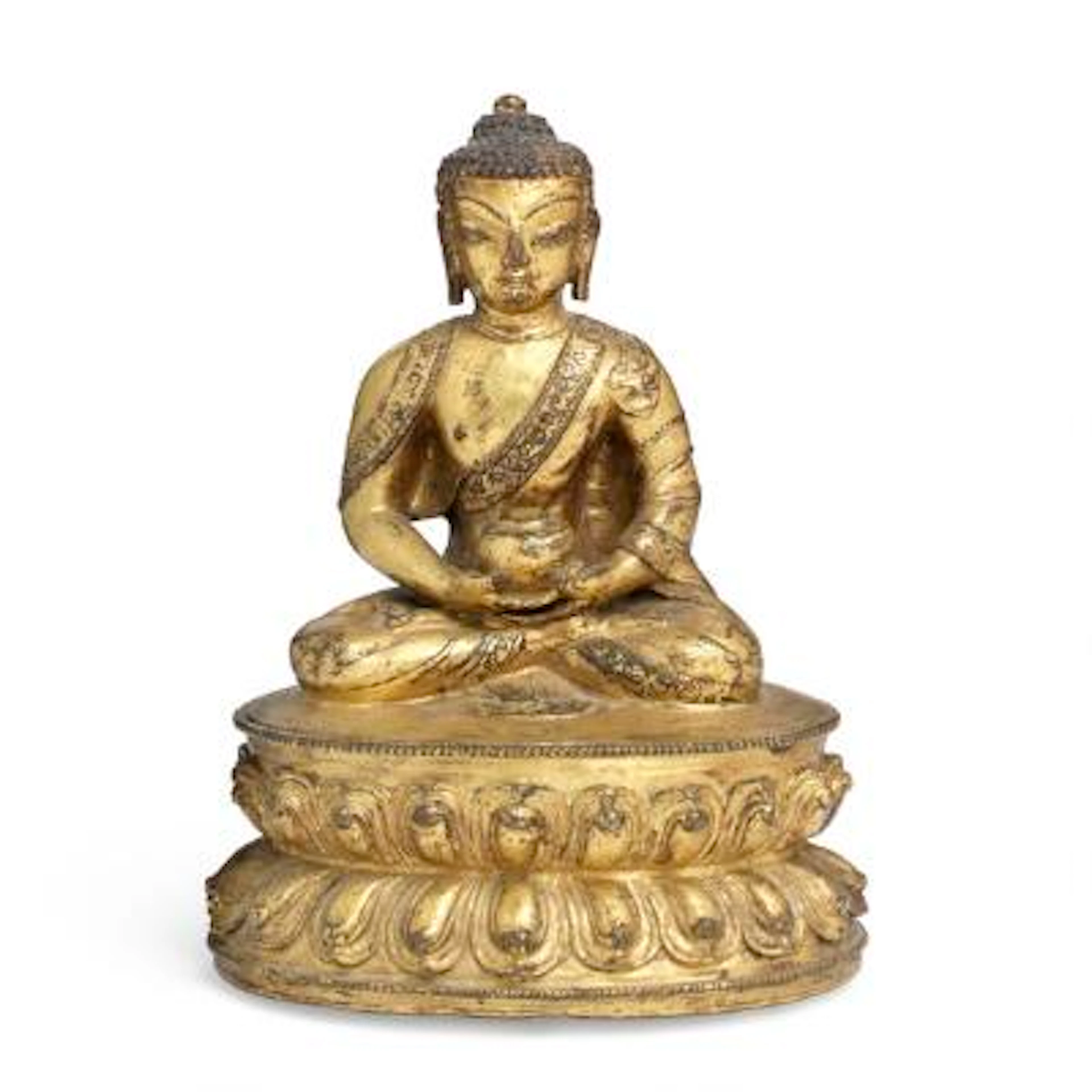 A Sino-Tibetan gilt copper alloy figure of Amitabha Buddha. 16th century.