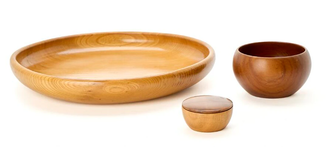 Kay Bojesen: A solid elm wood dish, a solid teak bowl and a small