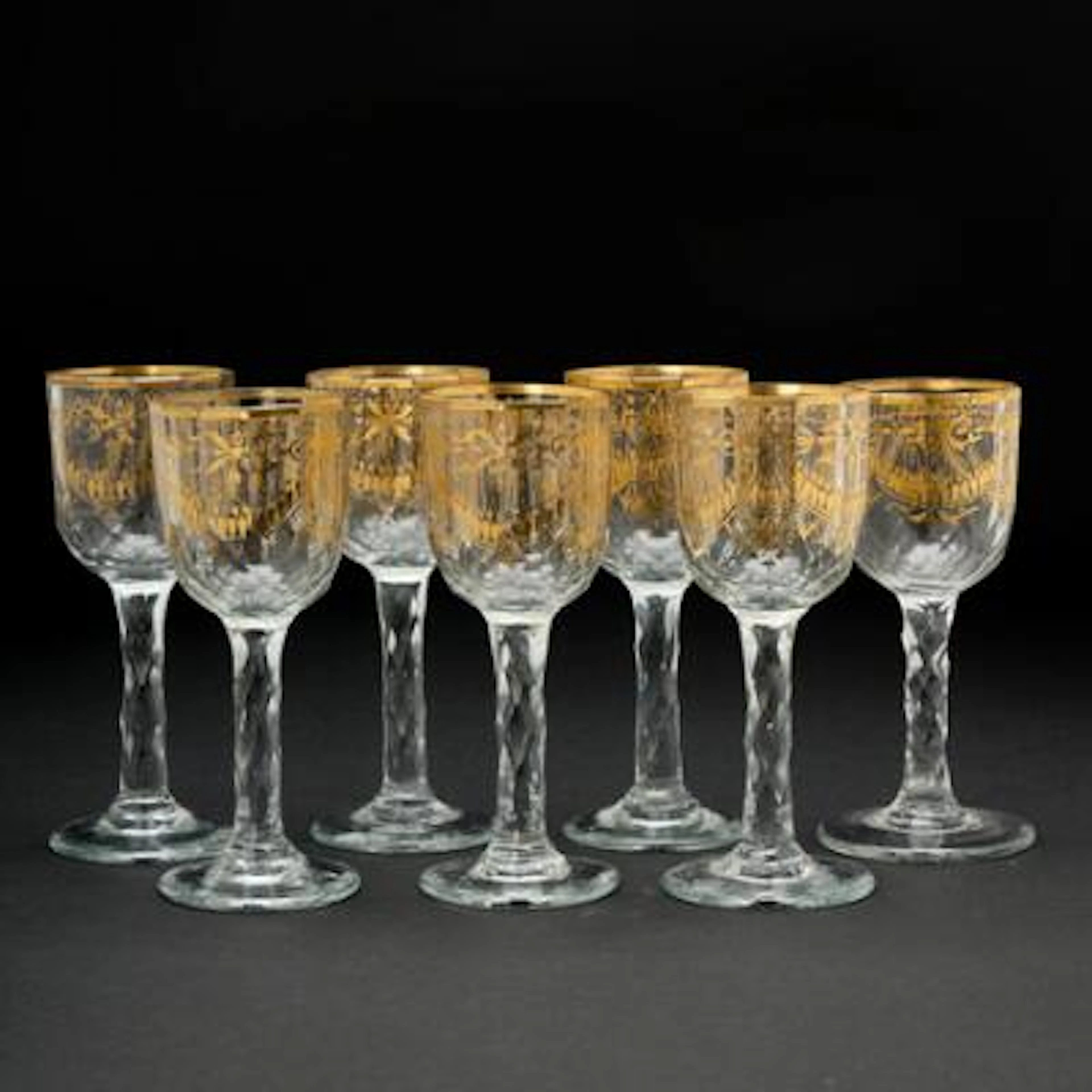 Collection of English glasses with facetted cuppa and stem, decorated