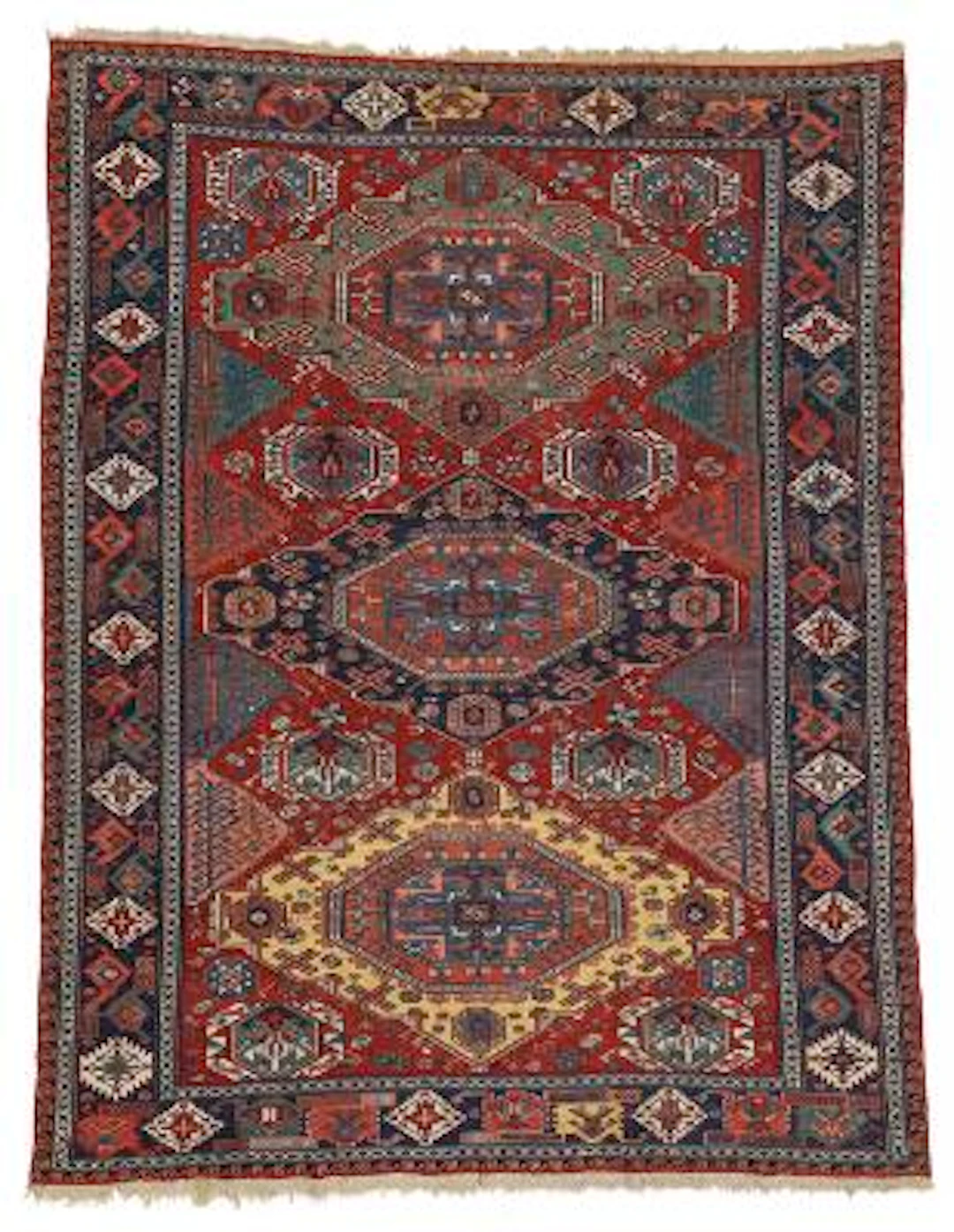 An antique Caucasian sumac carpet. Design with three stylized medallions.