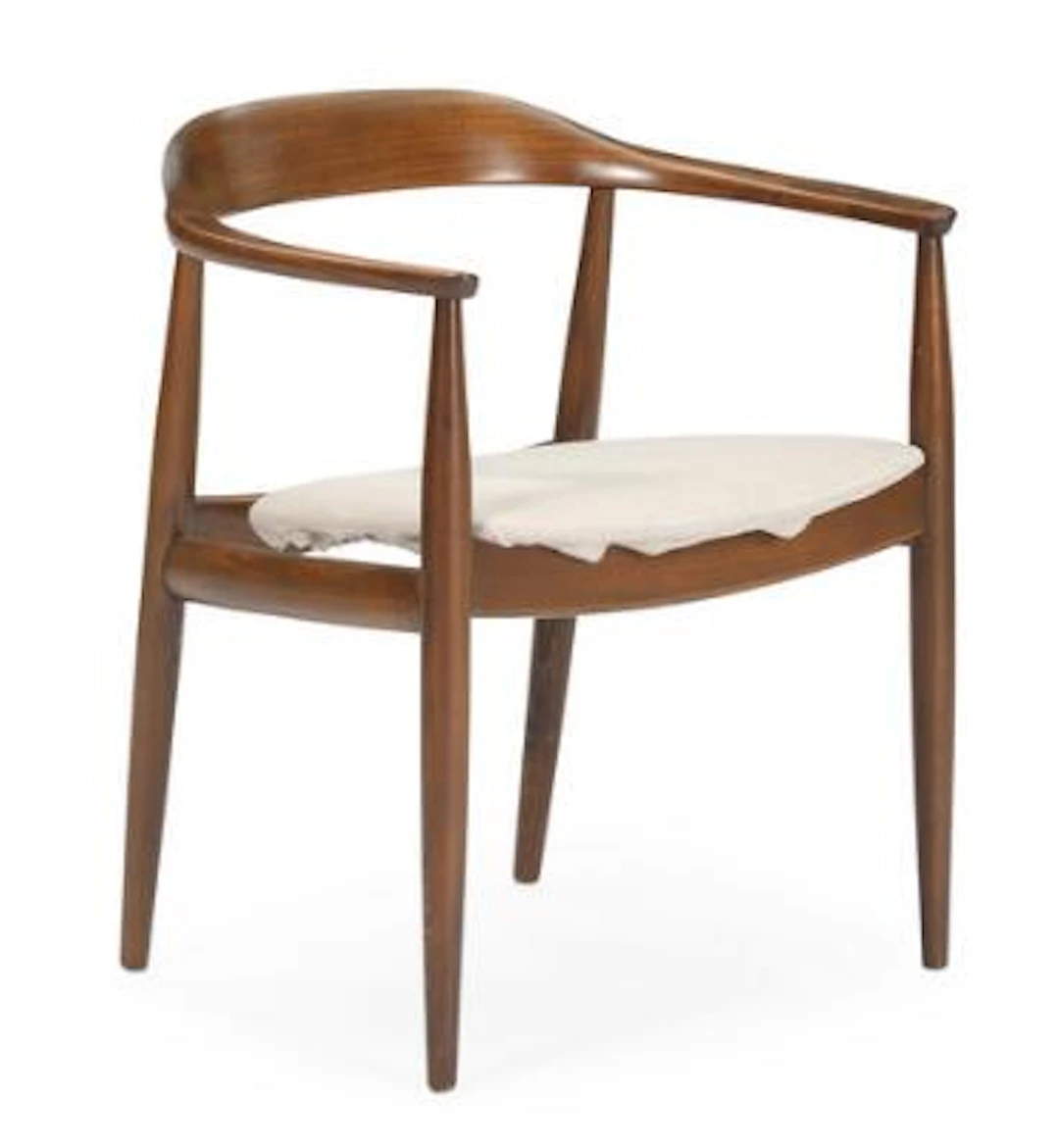 Arne Wahl Iversen, ascribed to: A dark stained elm wood armchair