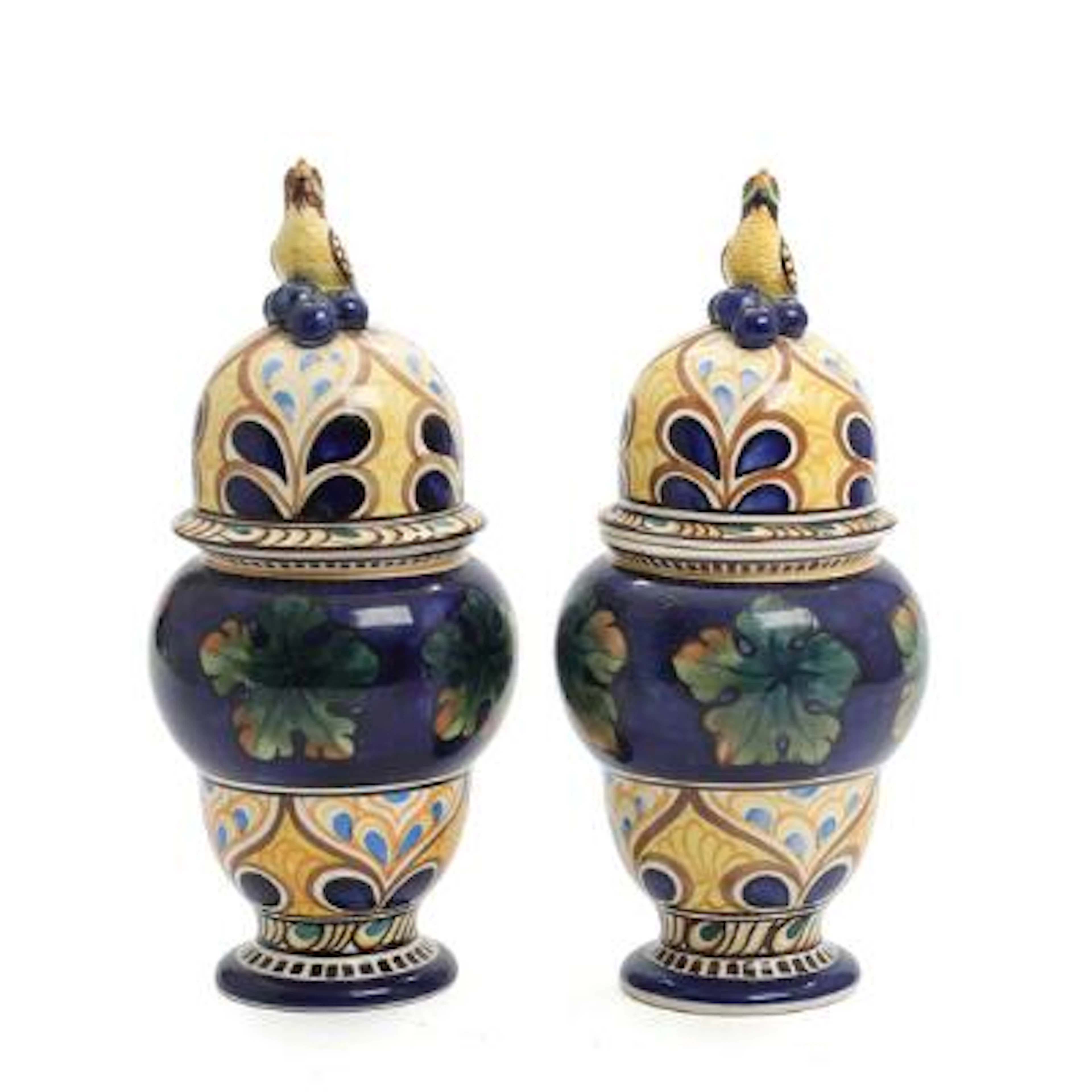 Chr. Joachim: A pair of faiance covered vases, decorated in colours