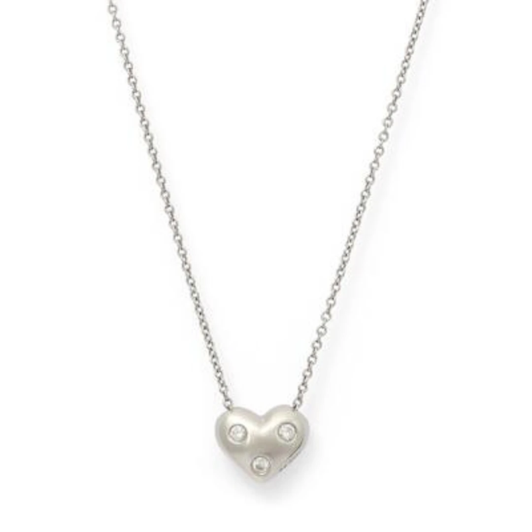 Tiffany & Co.: A "Etoile Heart" necklace with a heart-shaped diamond