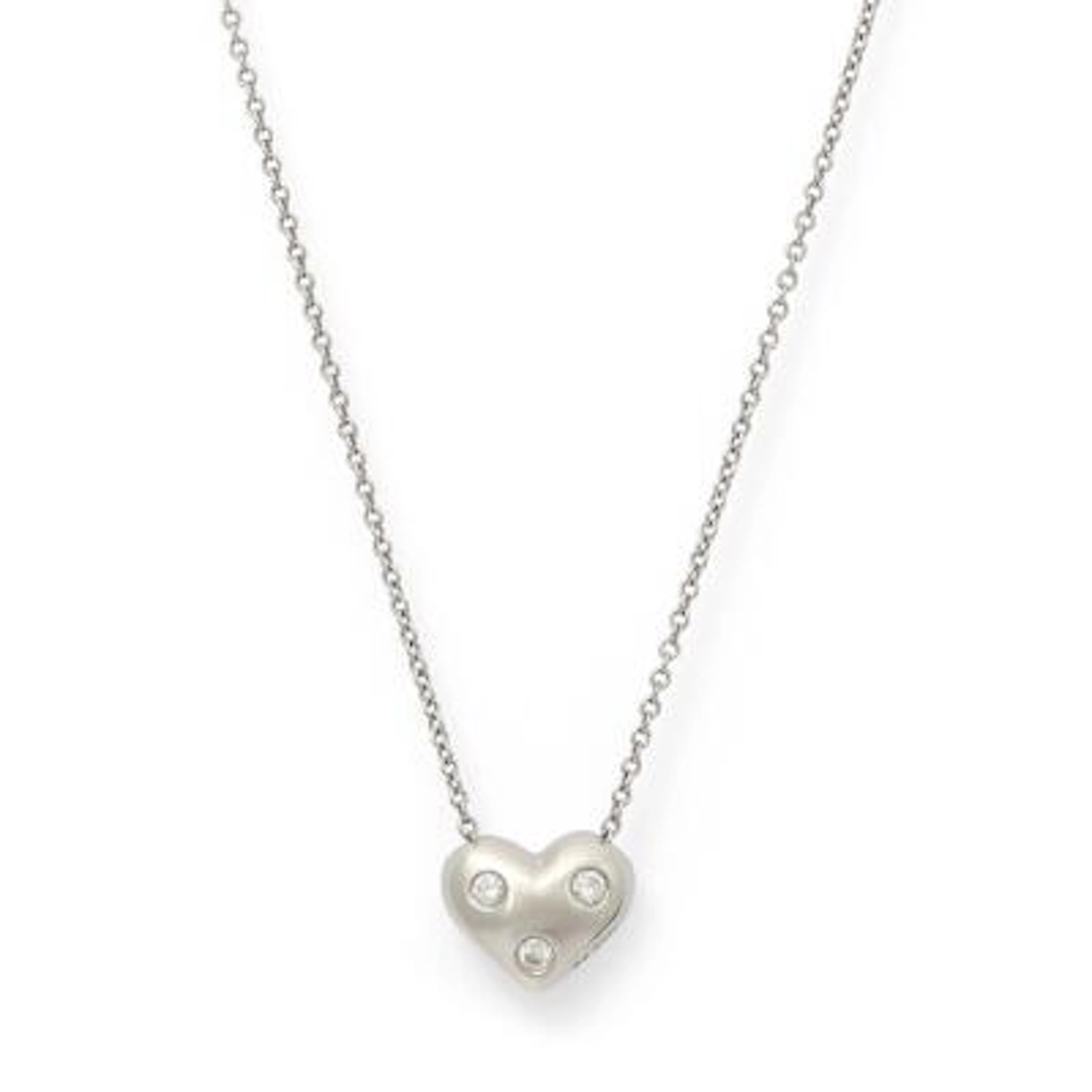 Tiffany & Co.: A "Etoile Heart" necklace with a heart-shaped diamond