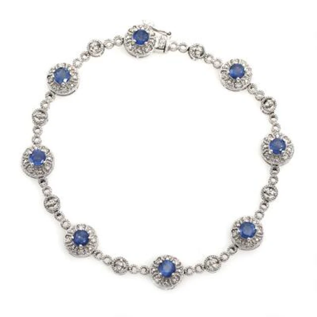 A sapphire and diamond bracelet set with numerous sapphires and diamonds