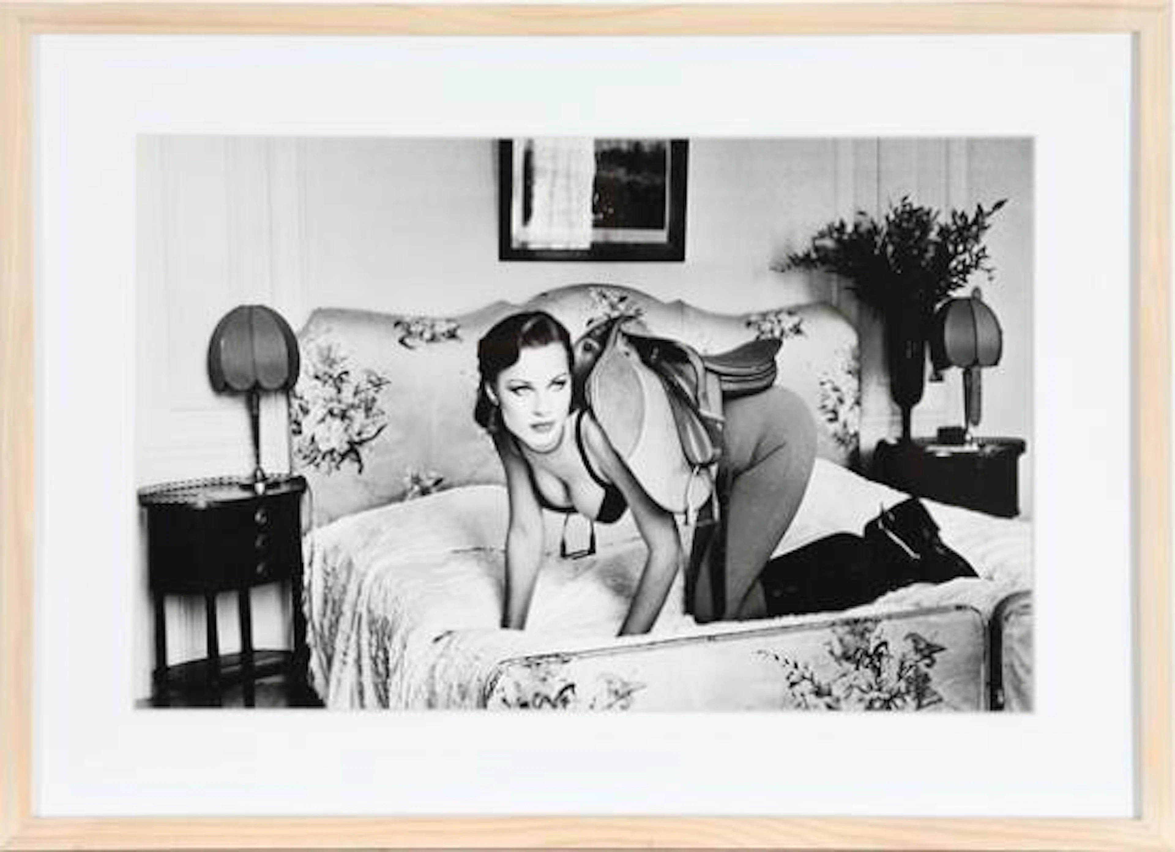 Helmut Newton: ‘Saddle 1, Paris, 1976’. Black-and-white recording.