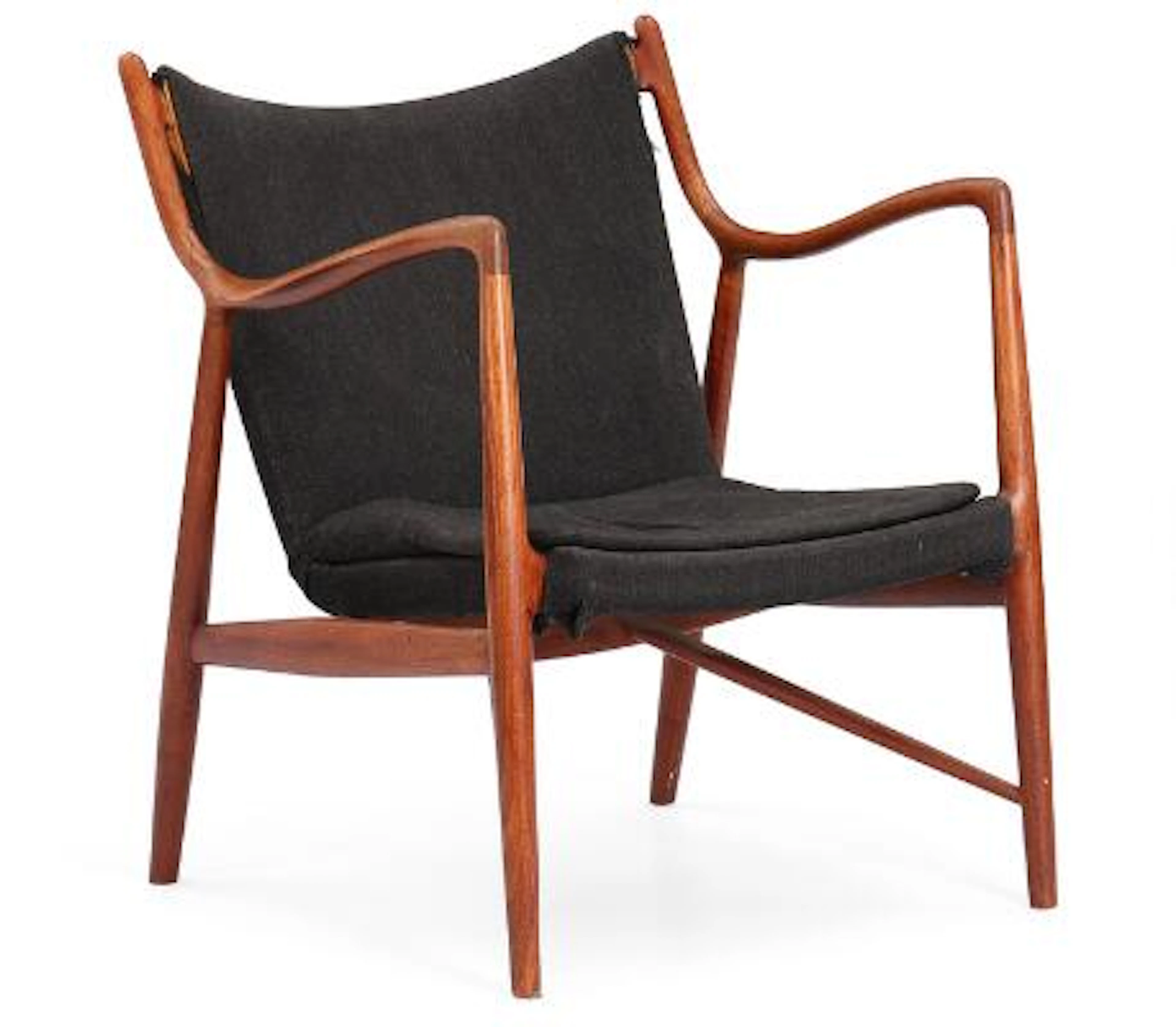 Finn Juhl: “FJ 45”. A teak easy chair. Upholstered with original black
