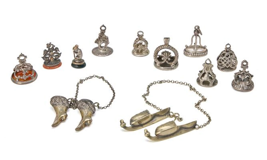 Collection of 11 silver seals, some with various stones, and two pairs