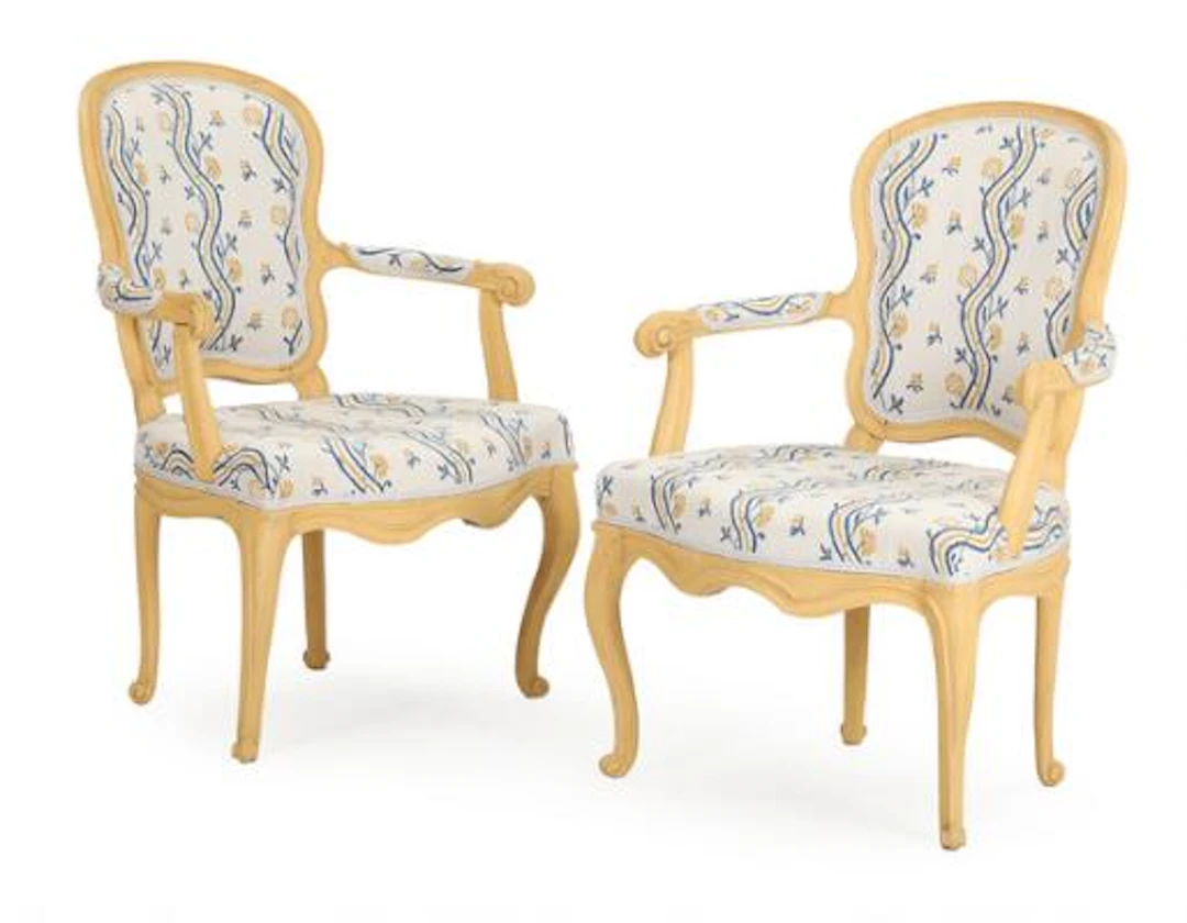 A pair of 18th century Swedish Rococo painted wood armchairs, seats