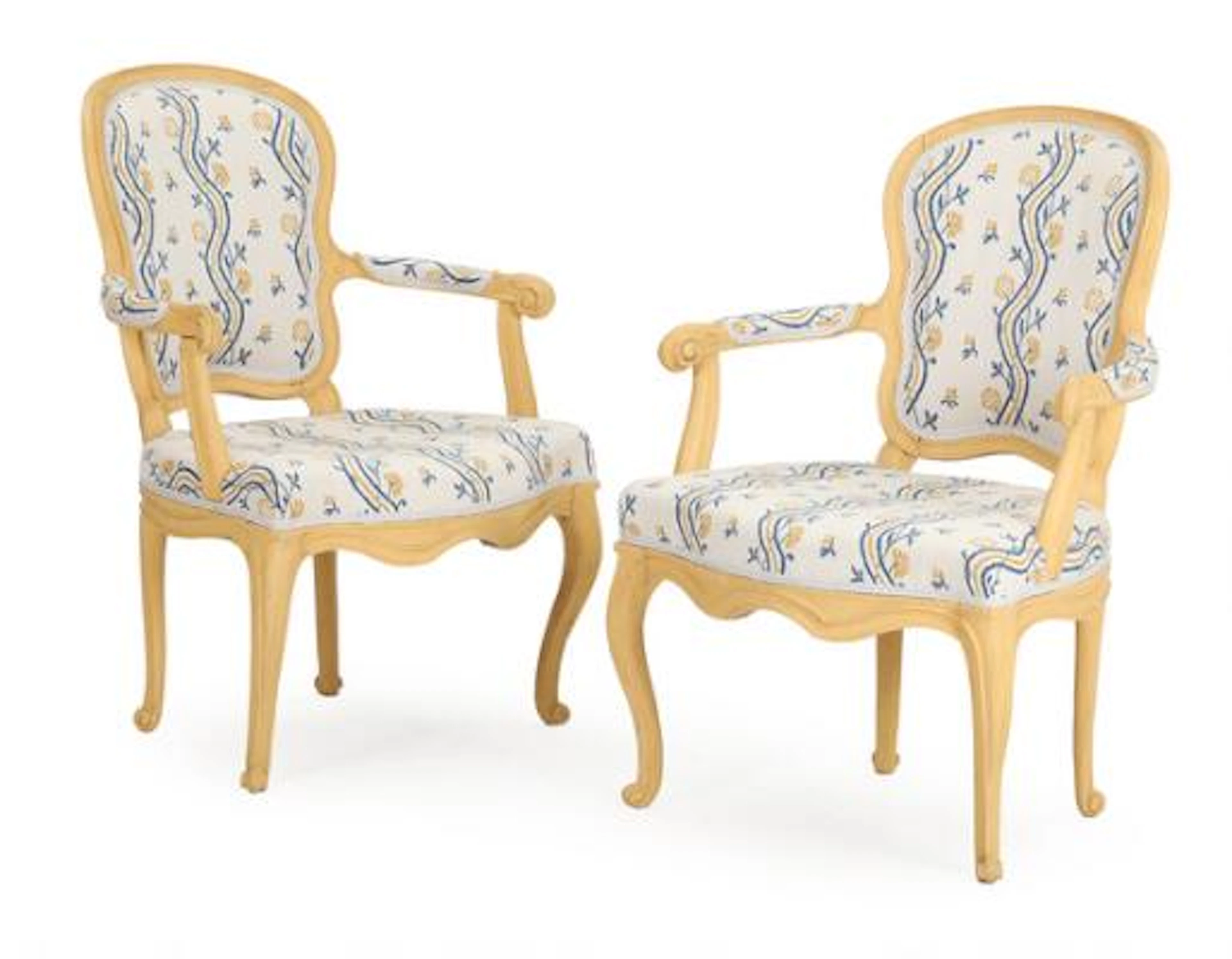 A pair of 18th century Swedish Rococo painted wood armchairs, seats