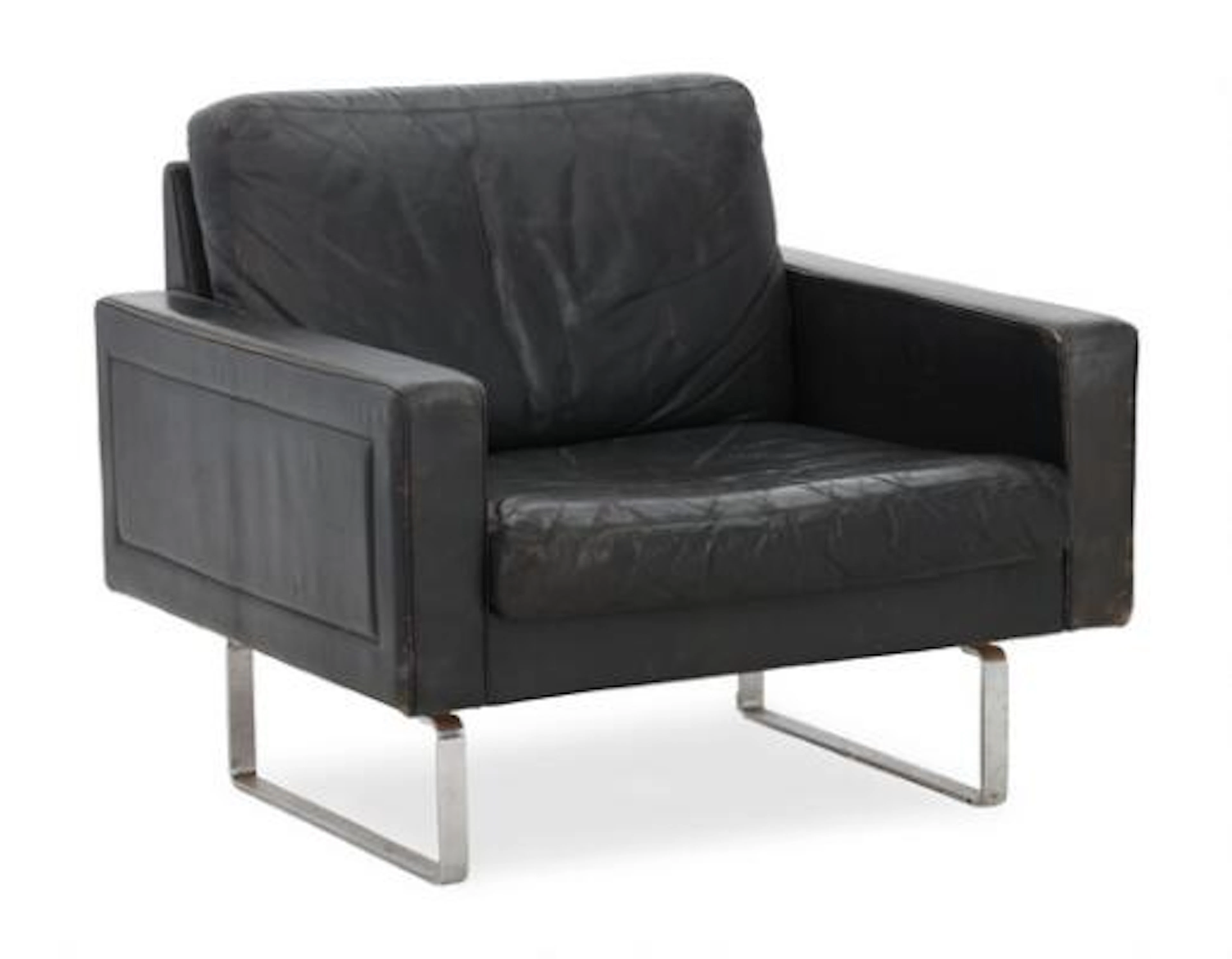 Asko: Steel easy chair. Upholstered with black leather. – Bruun Rasmussen