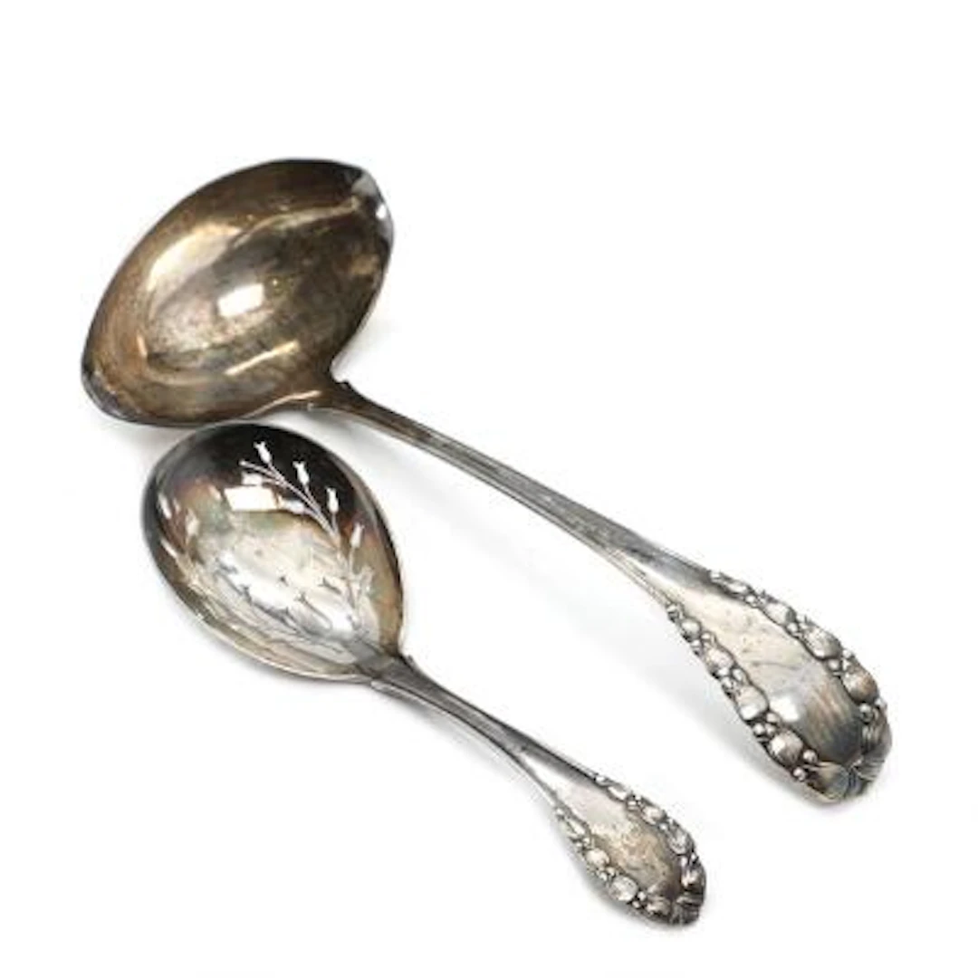 Georg Jensen: "Lily of the Valley". Silver Soup ladle and berry spoon.