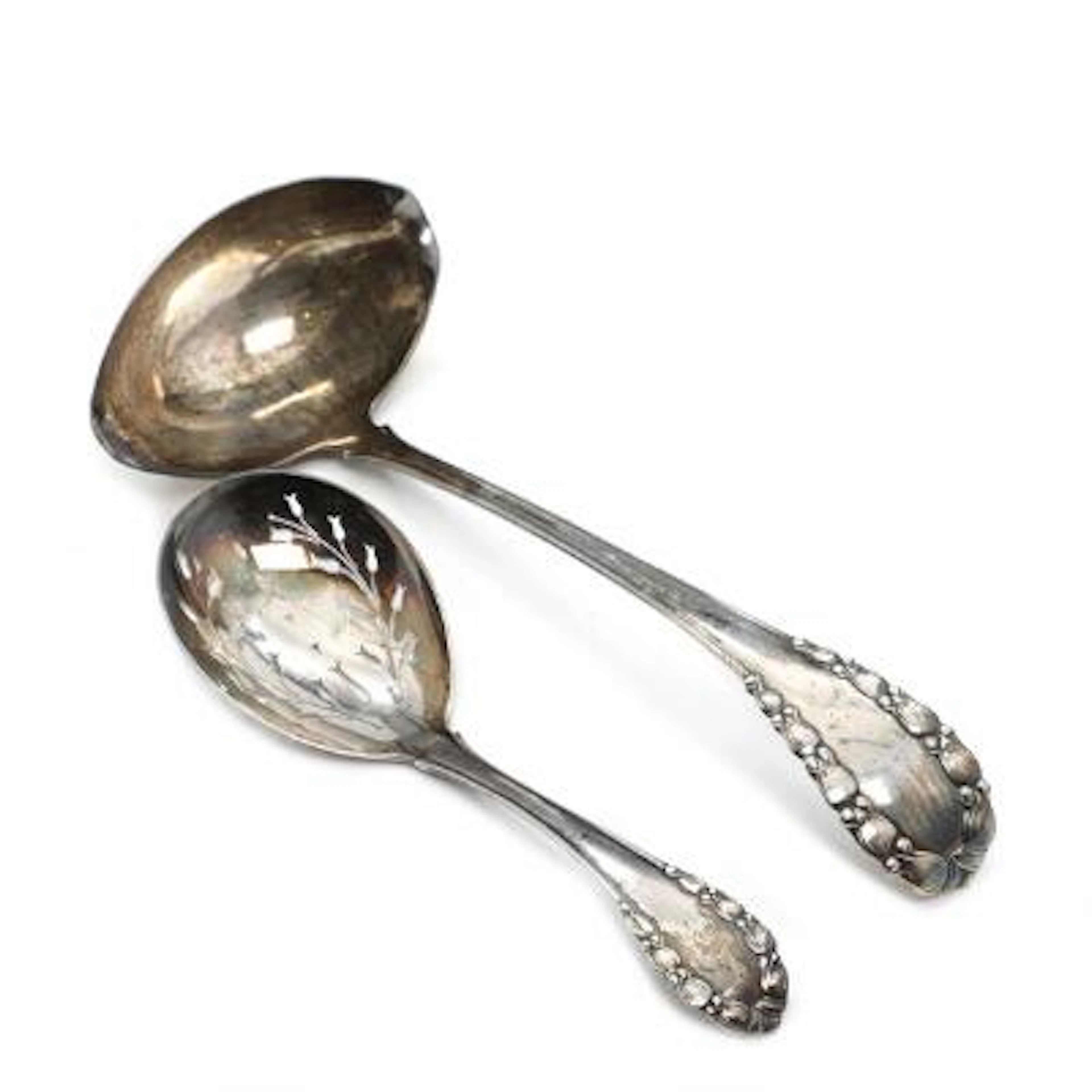 Georg Jensen: "Lily of the Valley". Silver Soup ladle and berry spoon.