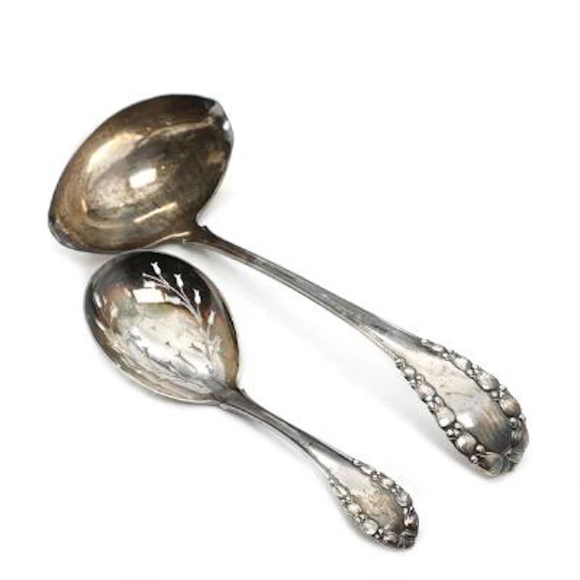 Georg Jensen: "Lily of the Valley". Silver Soup ladle and berry spoon.