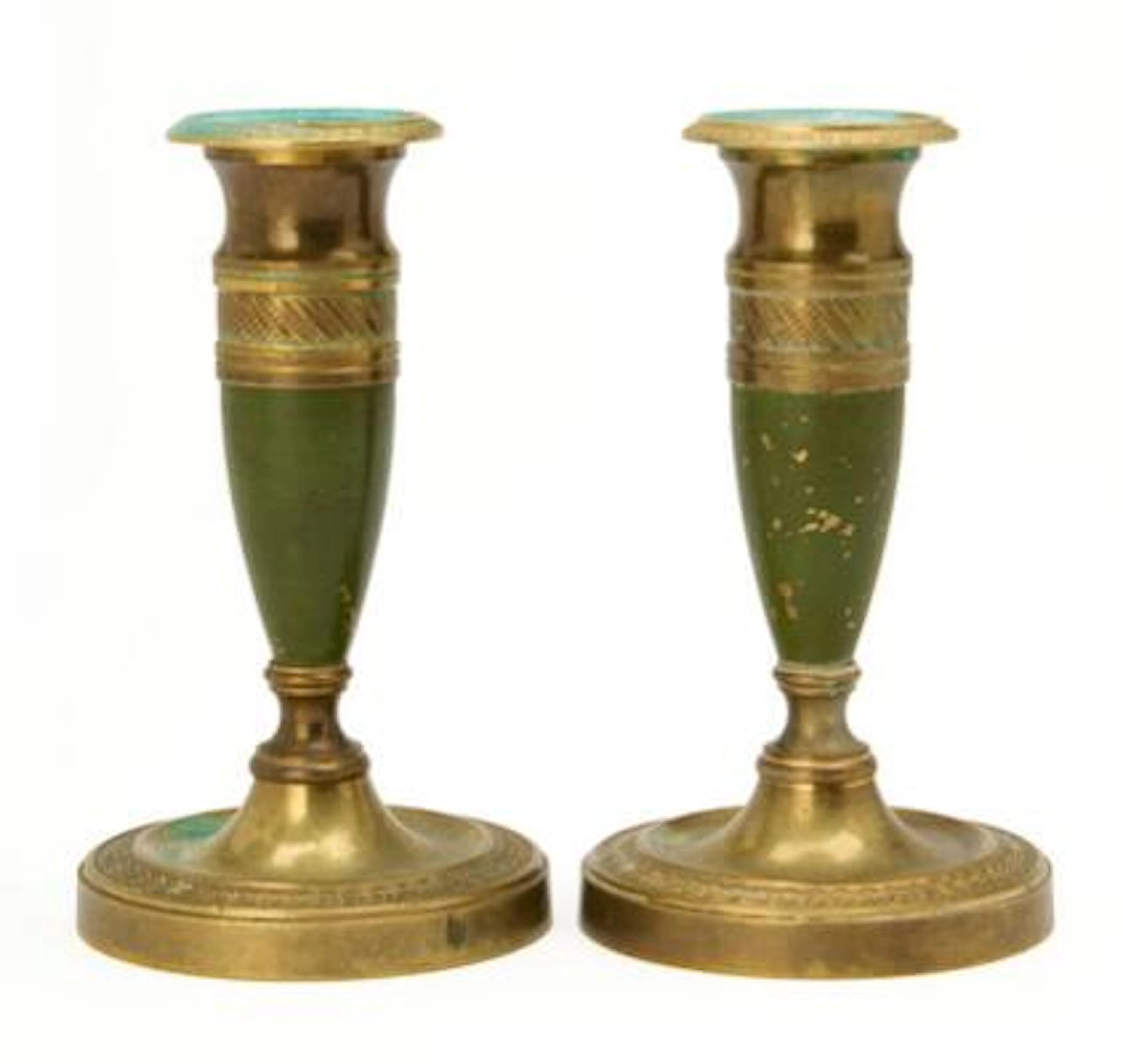 A pair of Empire style bronze candlesticks, France late 19th century.