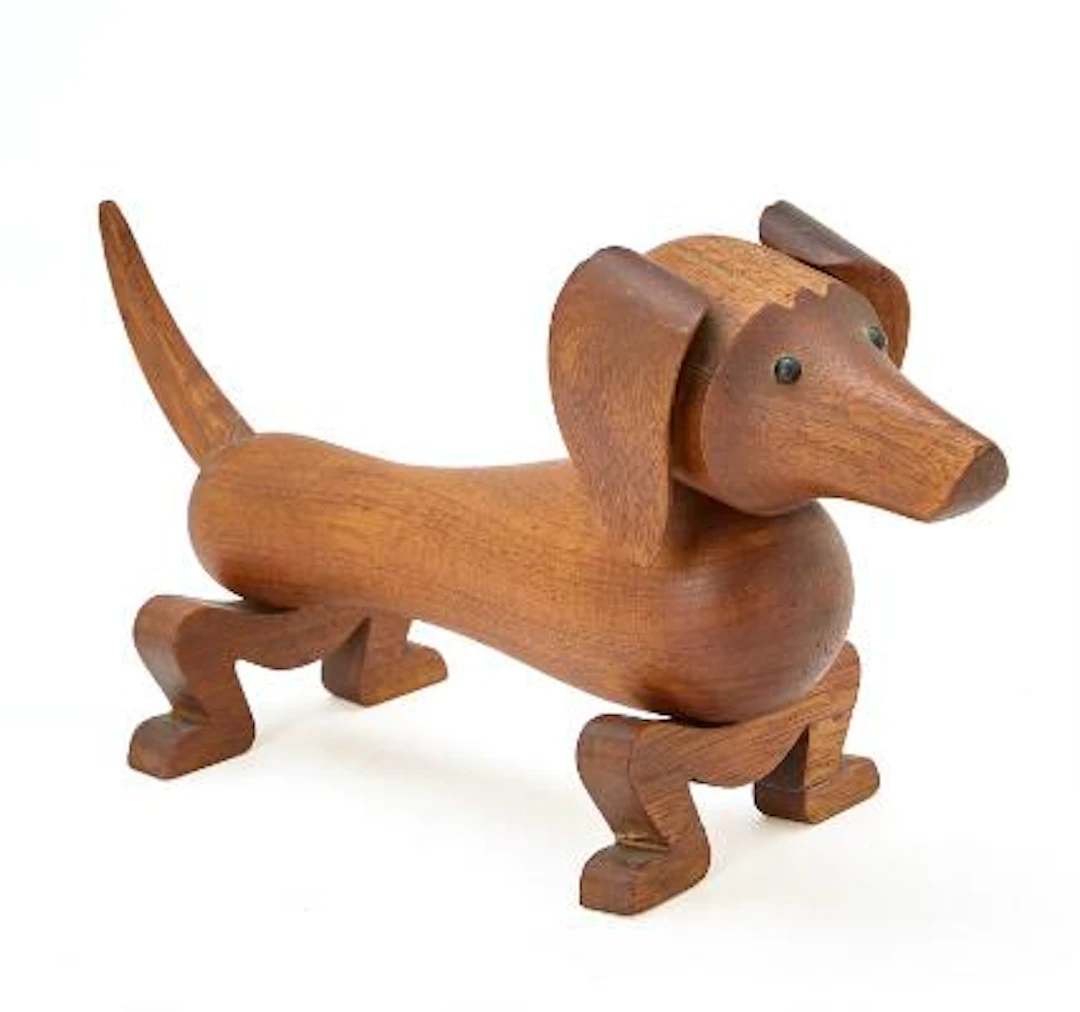 Kay Bojesen: A teak toy dog figure with movable head, tale and legs.
