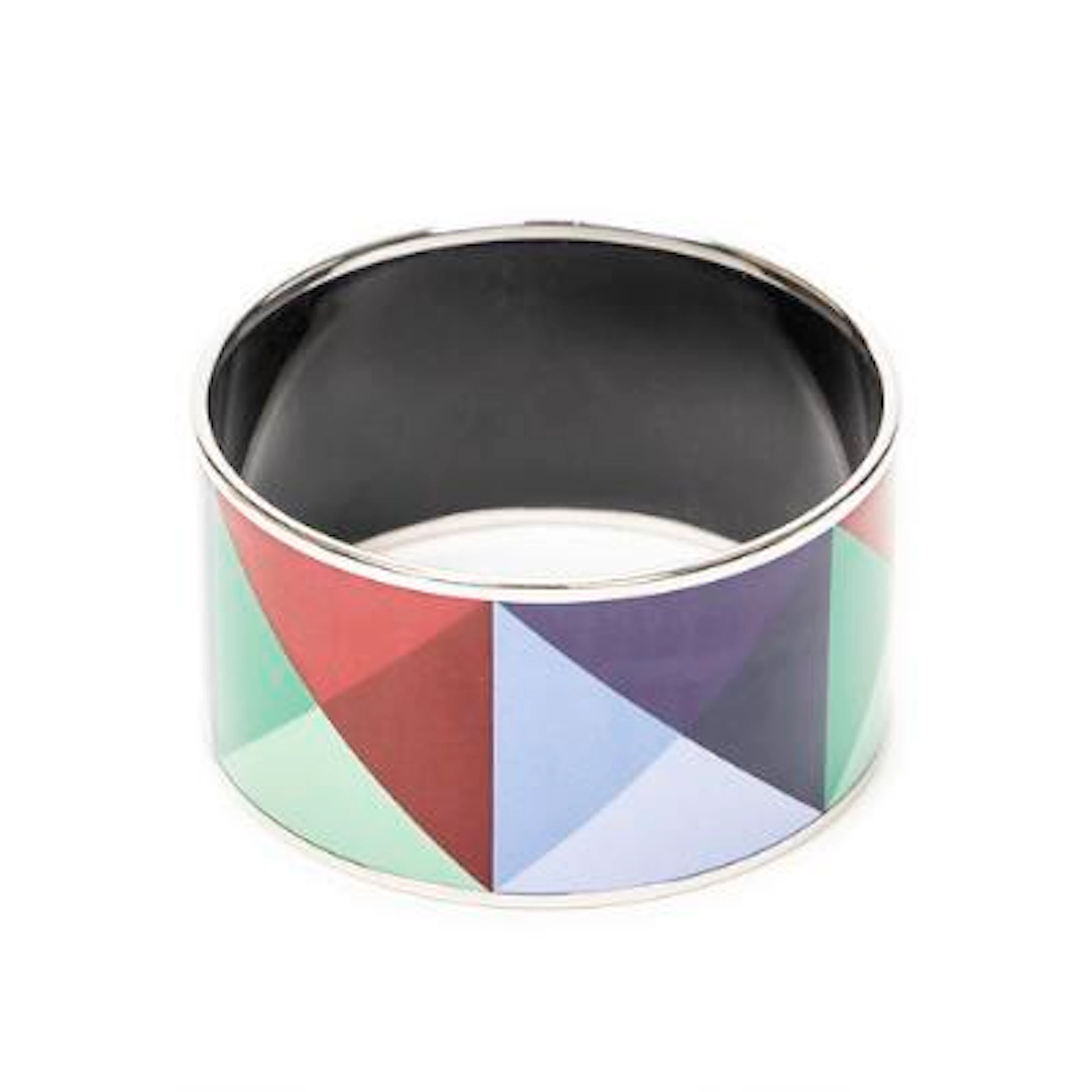 Hermès: A bangle in black enamel set with a multi-colored geometric