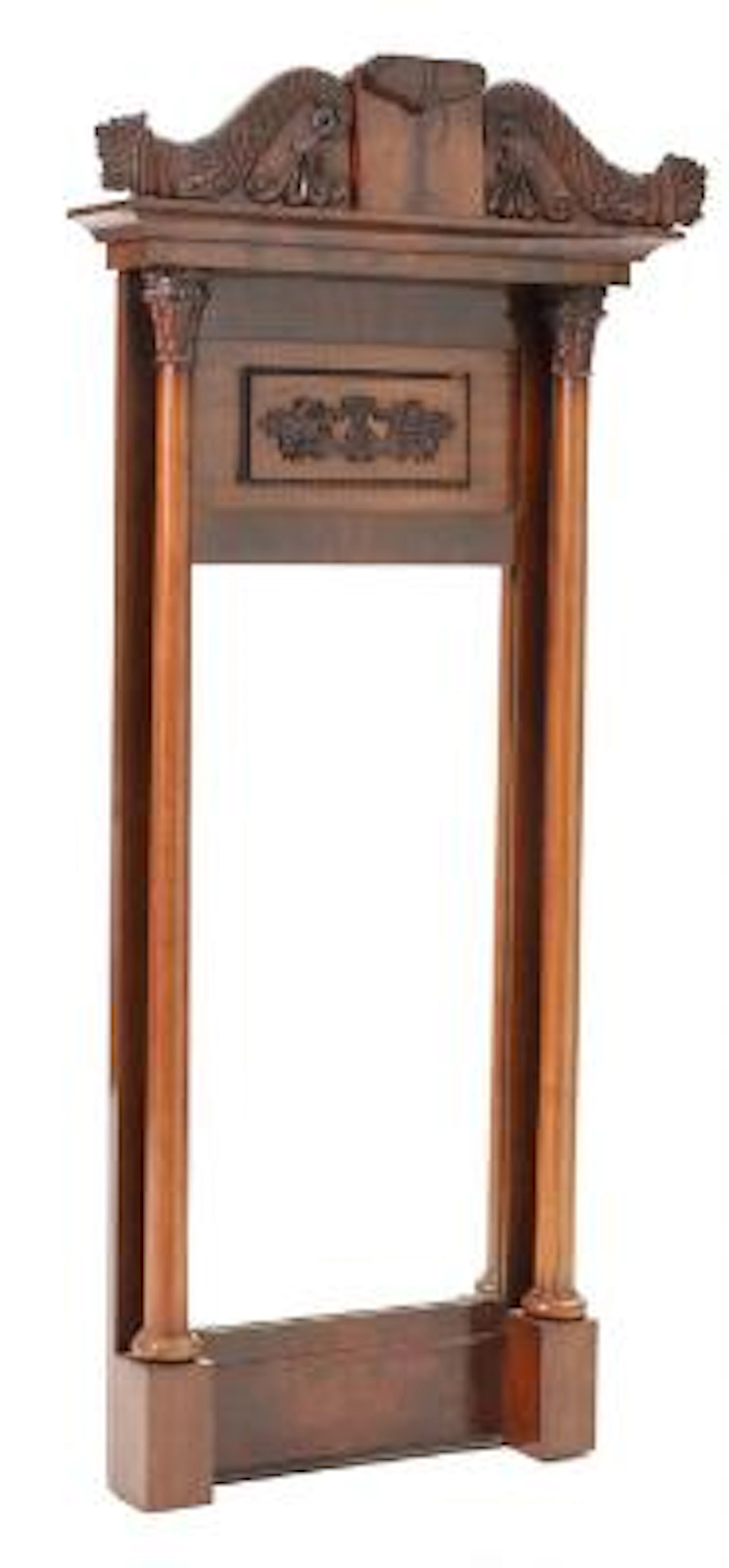 A late Empire mahogany mirror, flanked by columns. 19th century. H.