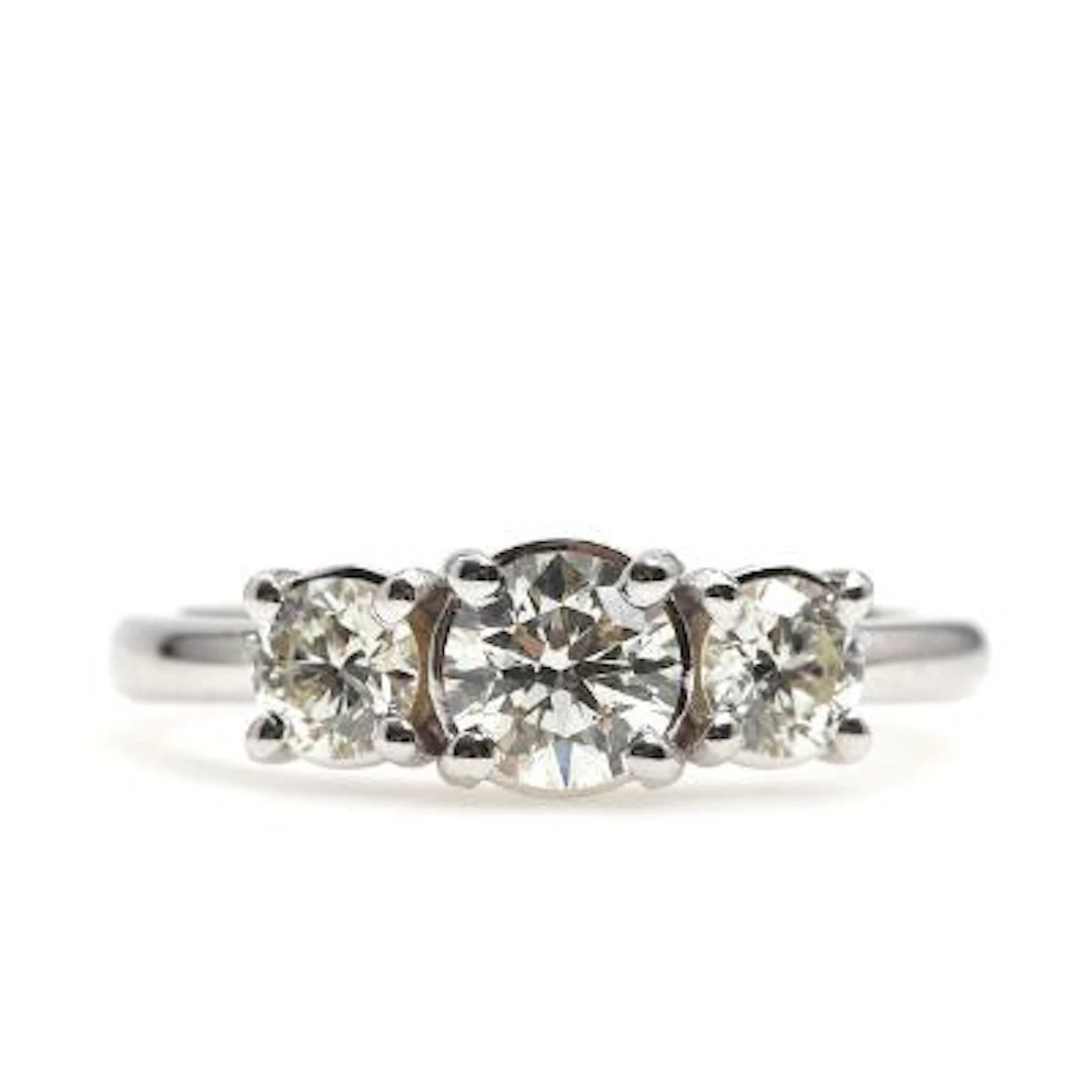 A diamond ring set with brilliant-cut diamonds weighing a total of