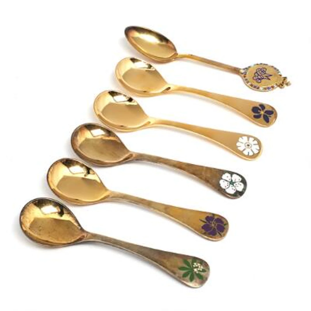 Georg Jensen: A collection of annual spoons and a commemorative spoon