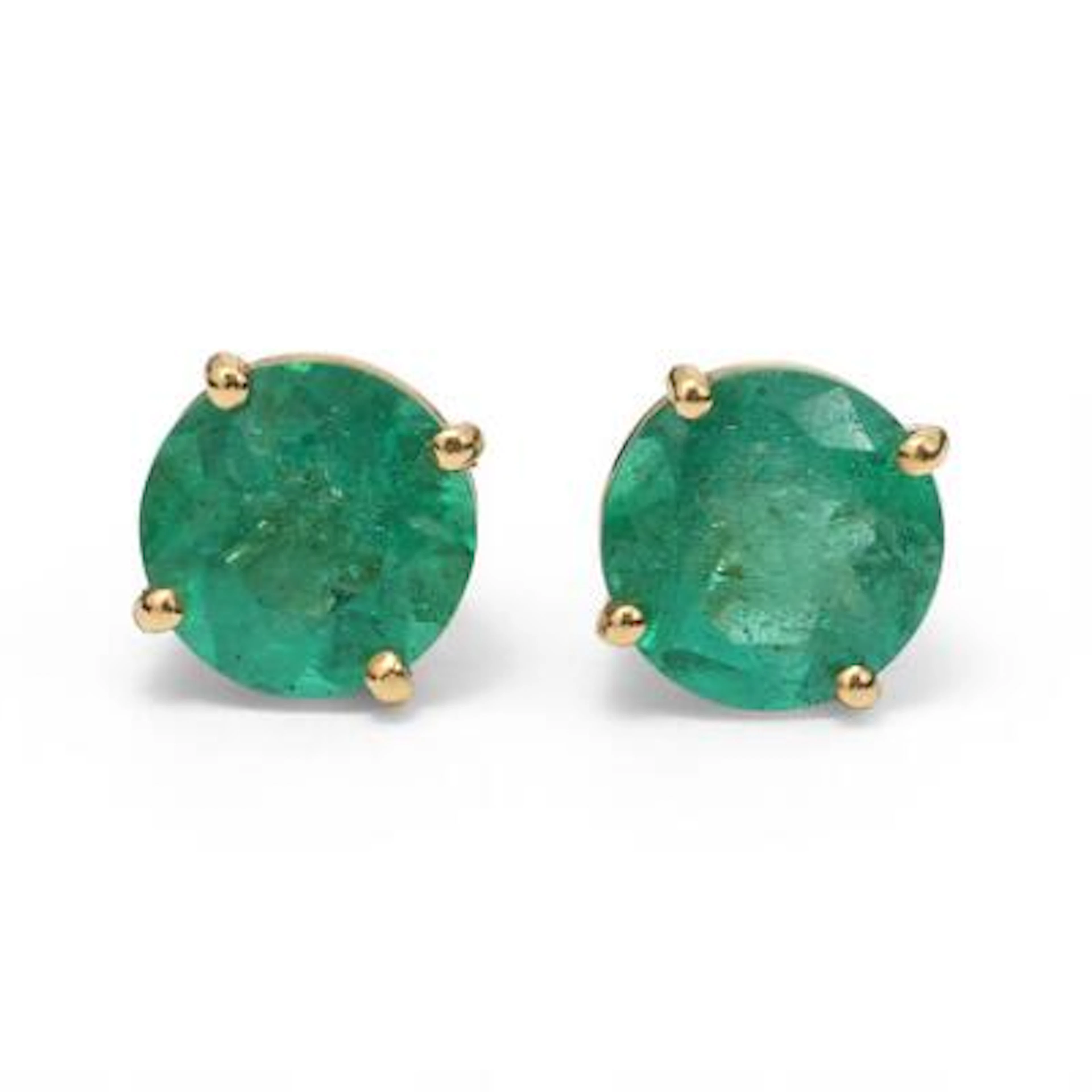 A pair of emerald ear studs each set with a circular-cut emerald