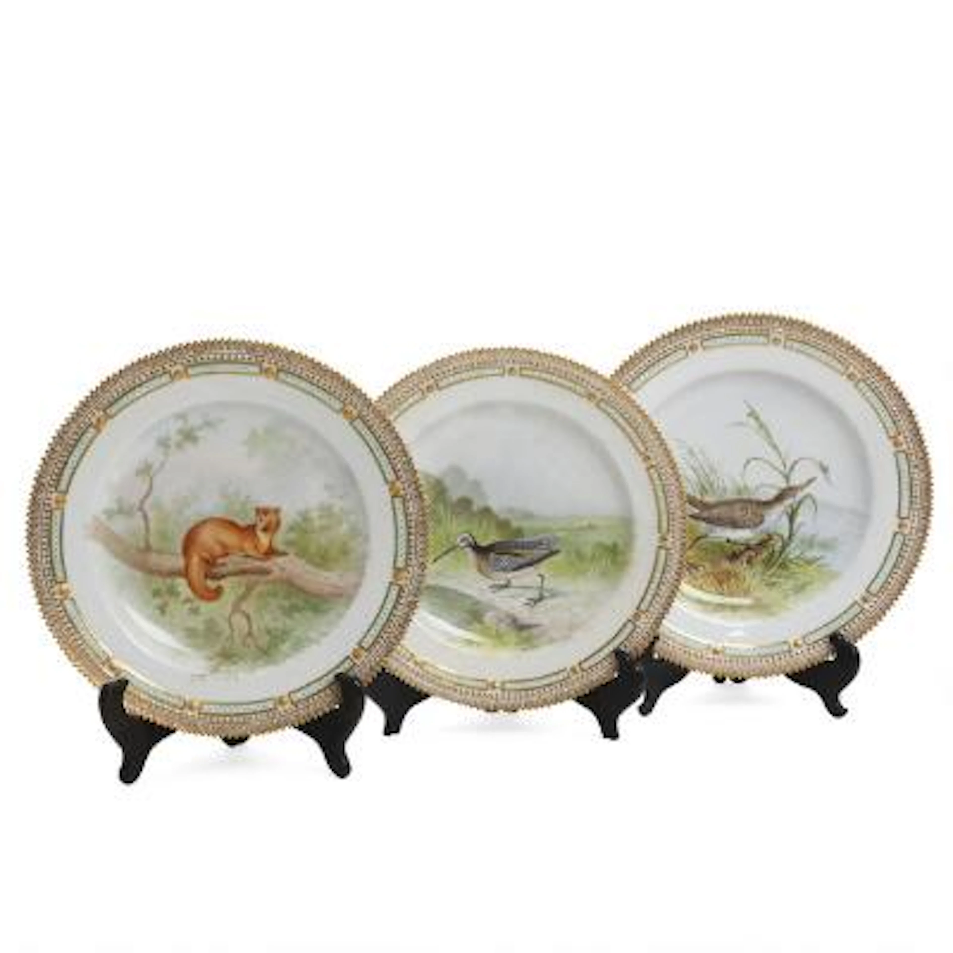 "Fauna Danica". Three dinner plates of porcelain, decorated with animals.