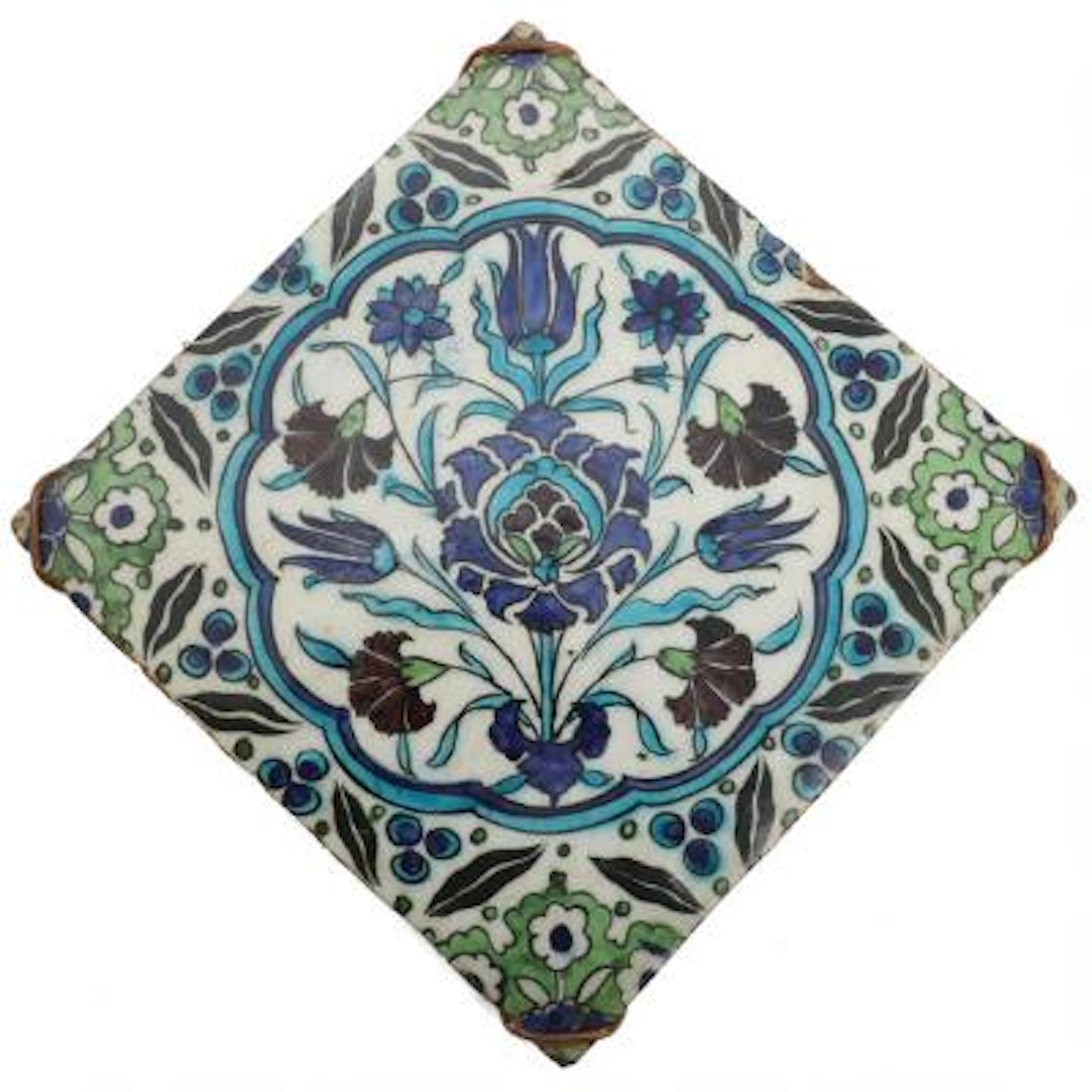 Iznik tile of fritware, decorated with flowers and foliage in blue