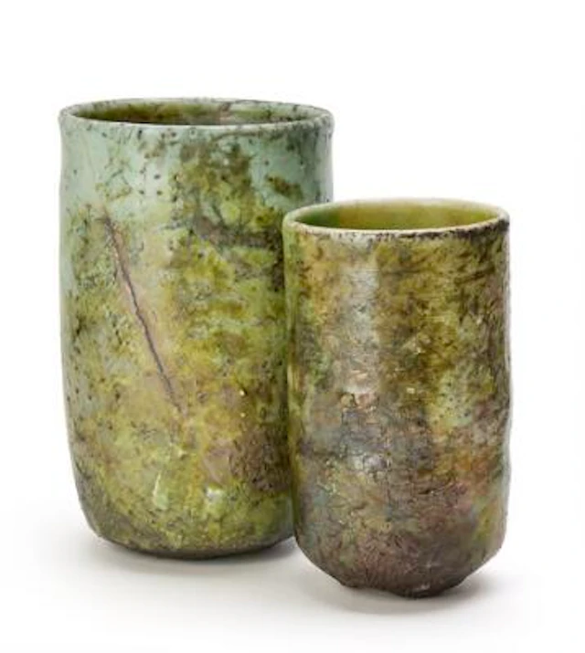 Per Weiss: Two cylindrical, raku-fire vases with green and rose glaze.